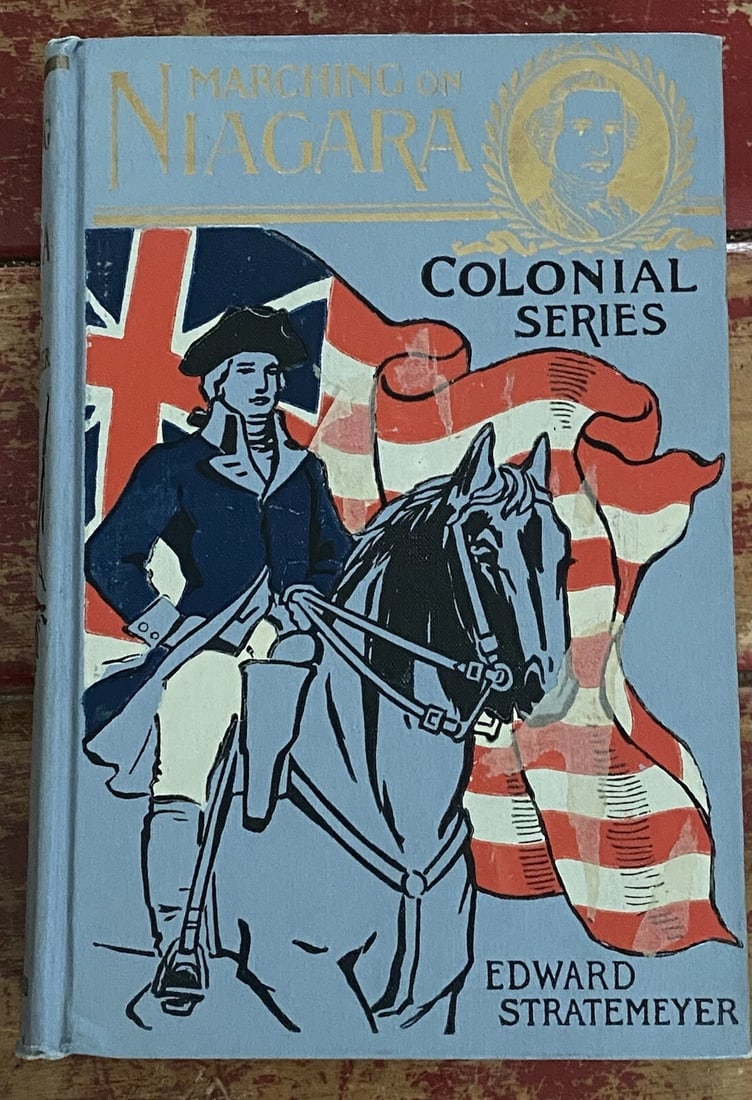 Marching On Niagara Edward Stratemeyer 1902 Lothrop HC RARE VG Condition: Marching On Niagara Edward Stratemeyer 1902 Lothrop HC RARE VG Condition. Colonial Series. Blue cloth boards with red, white & blue pictorial decoration on cover with gilt title. Spine title in gilt,