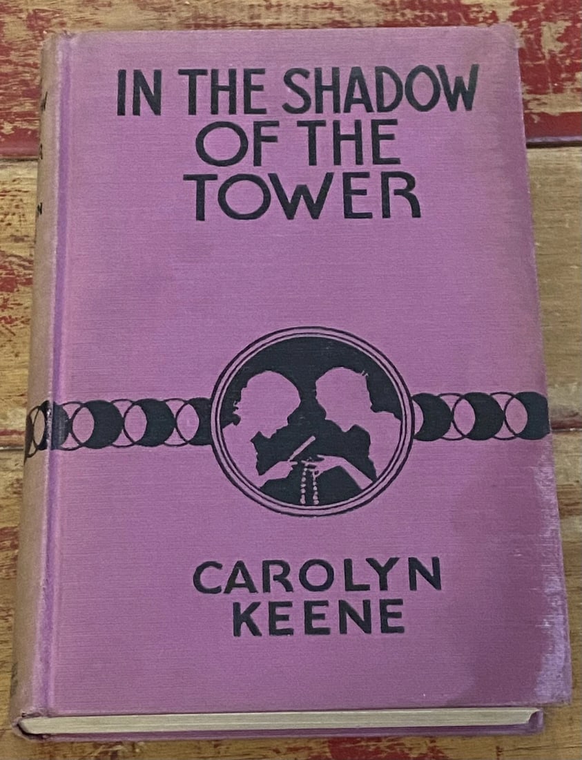 The Dana Girls In the Shadow of the Tower FIRST Edition 1934 Carolyn Keene VG: This is a first edition hardcover book titled "The Dana Girls In the Shadow of the Tower" by Carolyn Keene. It was published in 1934 by Grosset & Dunlap in New York and features illustrations by Ferdi