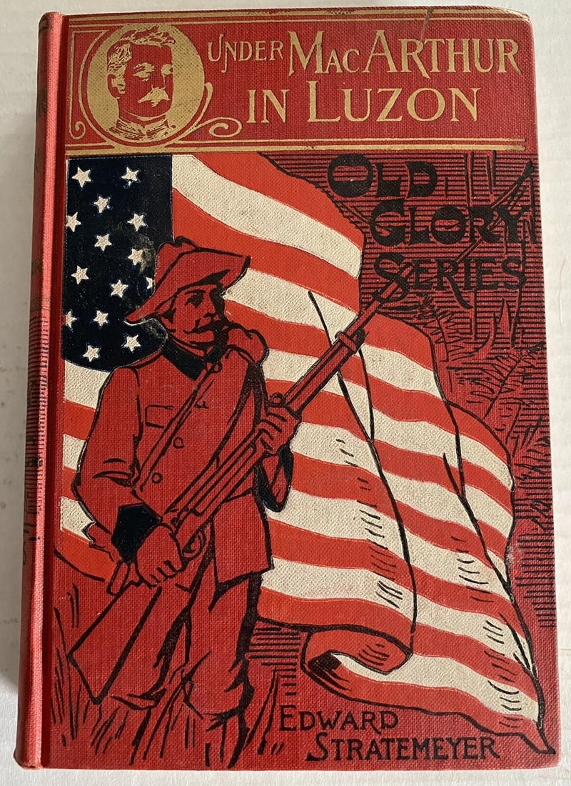 Under MacArthur In Luzon Edward Stratemeyer Old Glory Series HC 1901 Very Good!: Under Mac Arthur in Luzon by Edward Stratemeyer First Edition Published 1901 by Lothrop Lee & Shepard, Boston, MA. Illustrated by A.B. Shute. Pictorial front cover with gilt embossed decoration, gilt