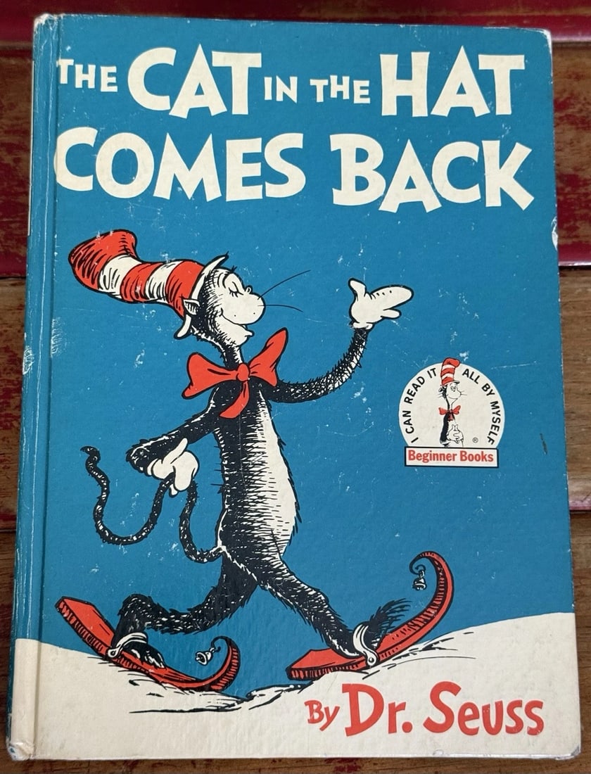 Dr. Seuss The Cat In The Hat Comes Back 1958 1st Educational Edition B-2: The product is a rare first educational edition of Dr. Seuss's "The Cat in the Hat Comes Back" published in 1958 by Random House in New York. The hardcover book is in its original English language and
