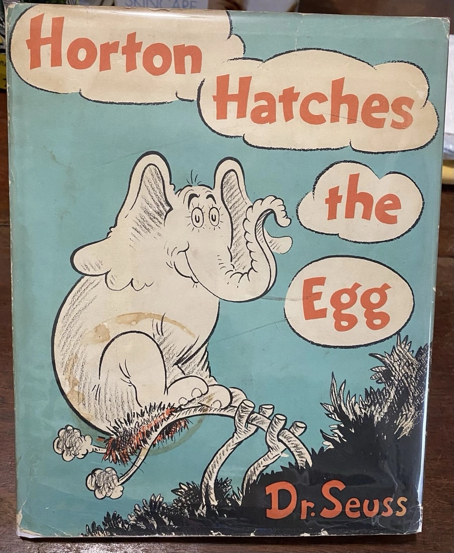 Horton Hatches the Egg 1940 First Ed Dr. Seuss First Ed HC/ DJ Near Fine/Good: Dive into the whimsical world of Dr. Seuss with this 1940 first edition early printing of "Horton Hatches The Egg." A treasure for collectors and young readers alike, this hardcover gem features the i