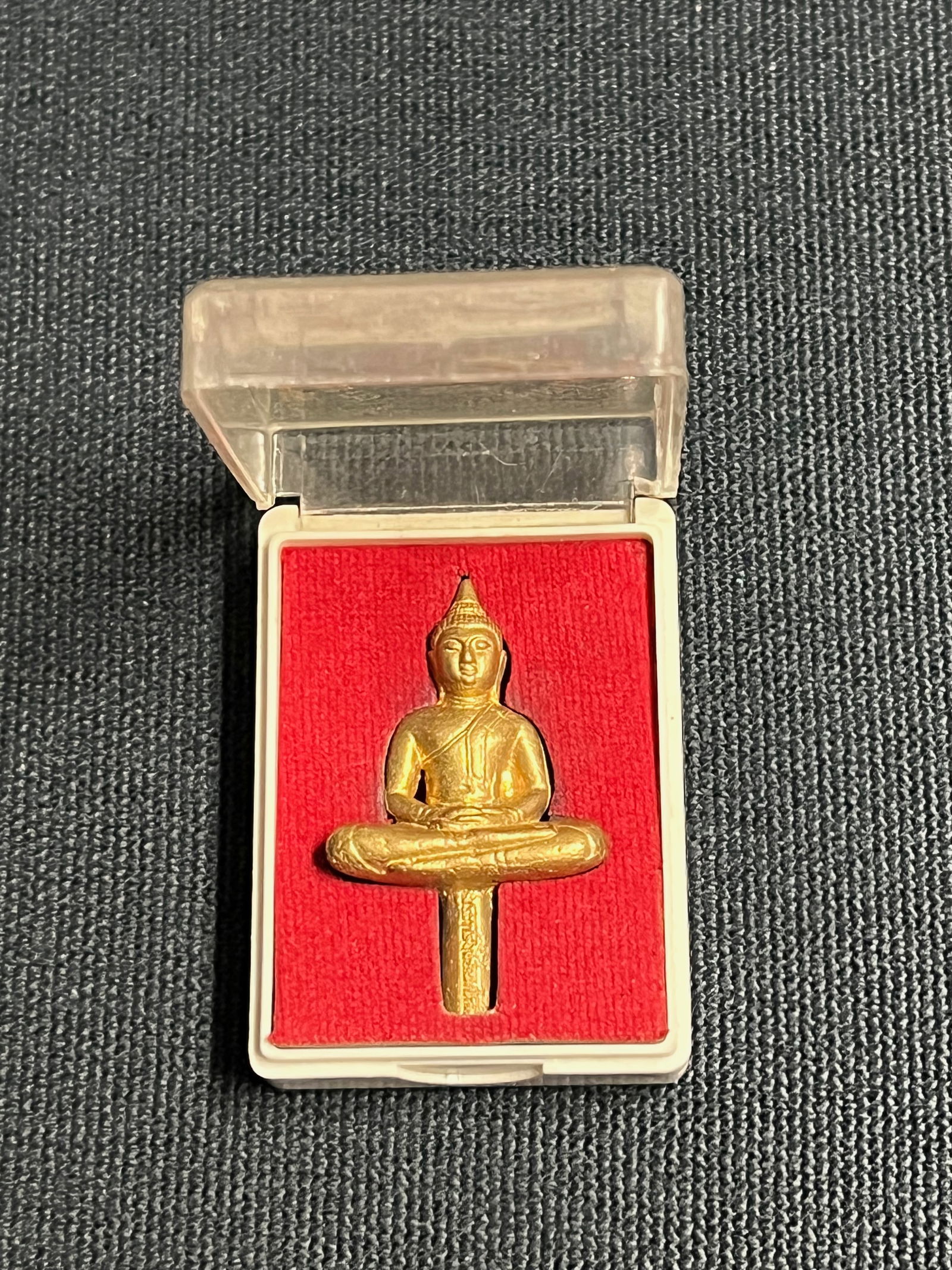 Sputheast Asian Brozne Buddha Amulet with Case: Title: Sputheast Asian Brozne Buddha Amulet with CaseDate/Period: Late 20th CenturyMaterials: BronzeDescription: Southeast Asian Bronze Buddha Amulet with Case Reserve: $80.00 Shipping:Domestic: