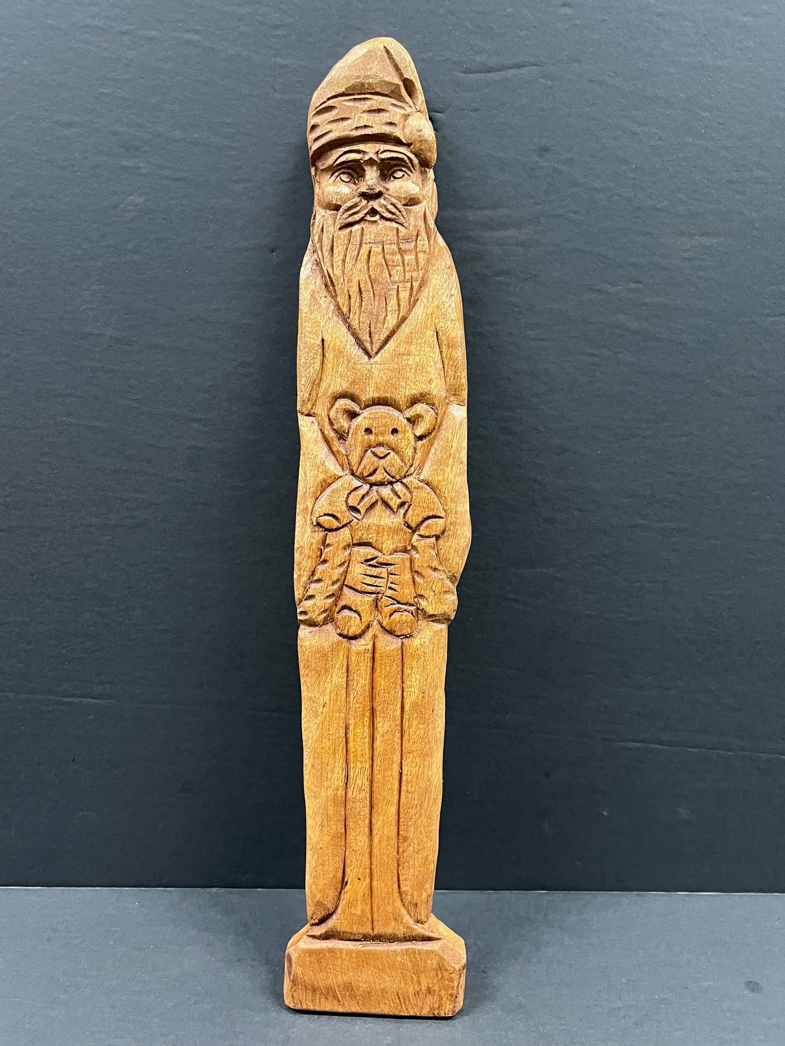 Carved Wood Santa Claus Wall Sculpture: Title: Carved Wood Santa Claus Wall SculptureDate/Period: Late 20th CenturyMaterials: WoodDescription: Carved Wood Santa Claus Wall Sculpture Reserve: $40.00 Shipping:Domestic: Flat-rate of