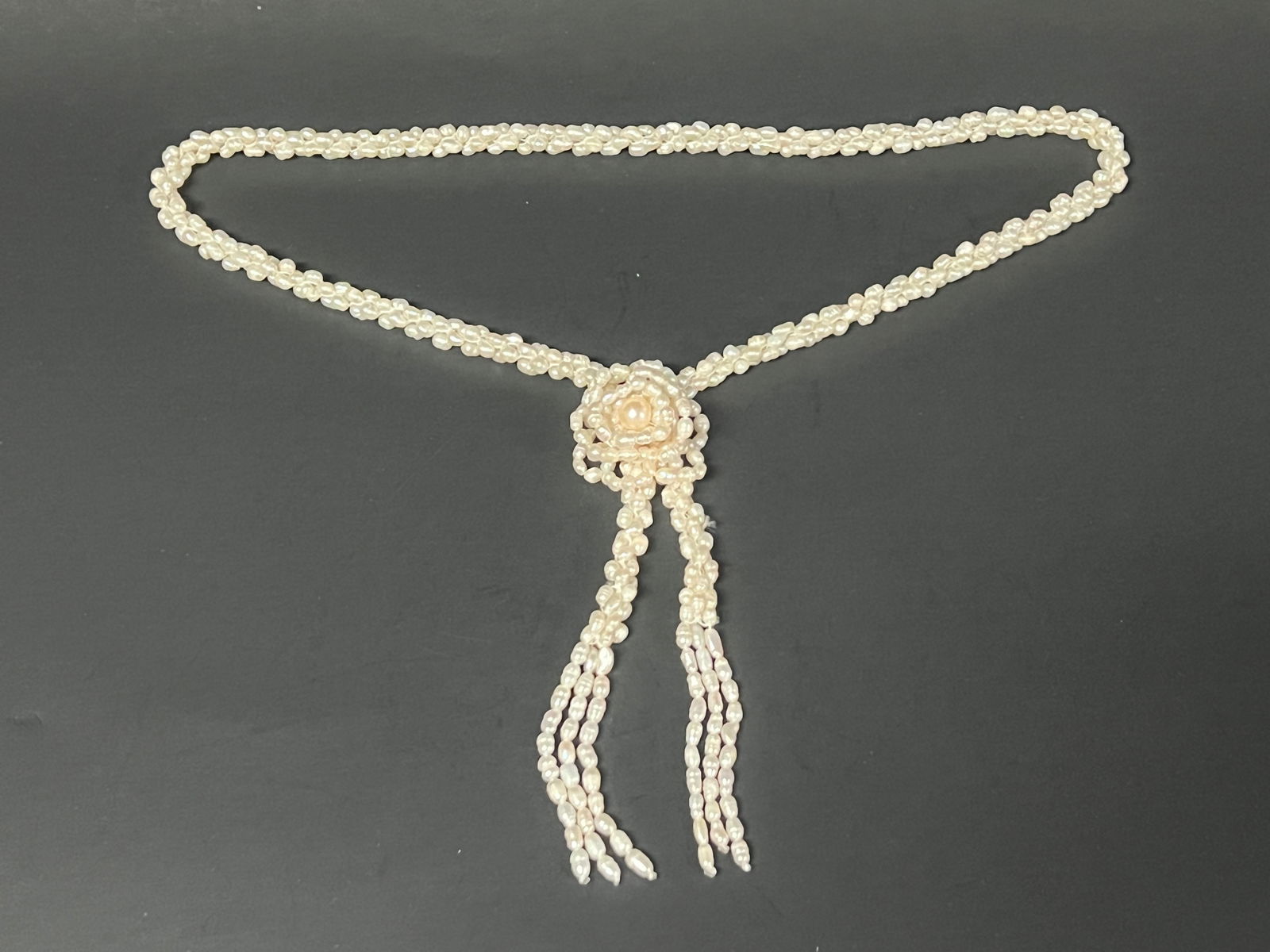 Southeast Asian Freshwater Rice Shape Cultured Pearl Necklace: Title: Southeast Asian Freshwater Rice Shape Cultured Pearl NecklaceDate/Period: Late 20th CenturyMaterials: PearlDescription: Southeast Asian Freshwater Rice Shape Cultured Pearl Necklace 