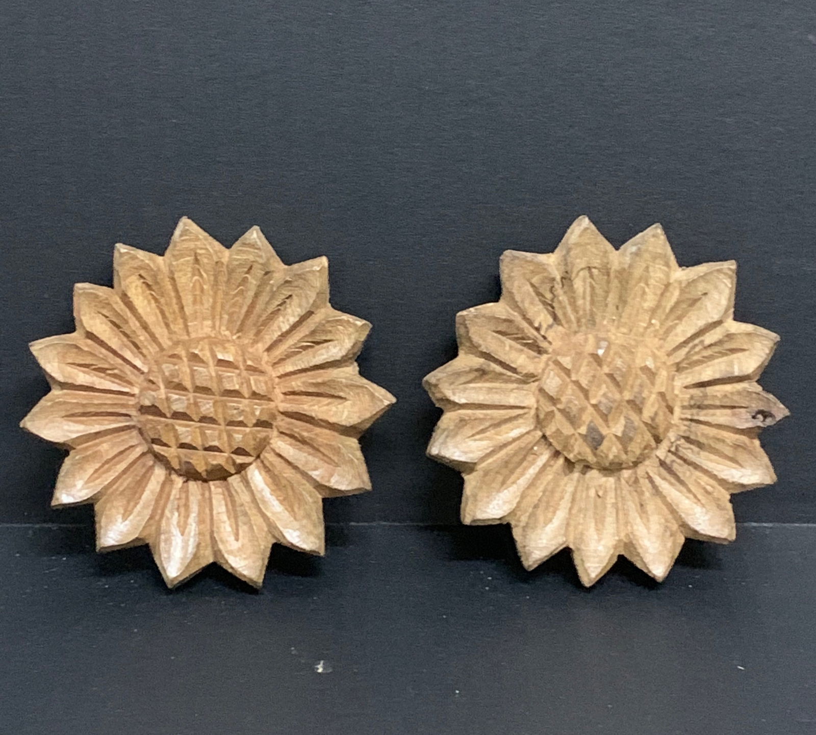 Carved Wood Sun Flower Sculpture Set of 2: Title: Carved Wood Sun Flower Sculpture Set of 2 Date/Period: Late 20th CenturyMaterials: WoodDescription: Carved Wood Sun Flower Sculpture Reserve: $40.00 Shipping:Domestic: Flat-rate of $20.00