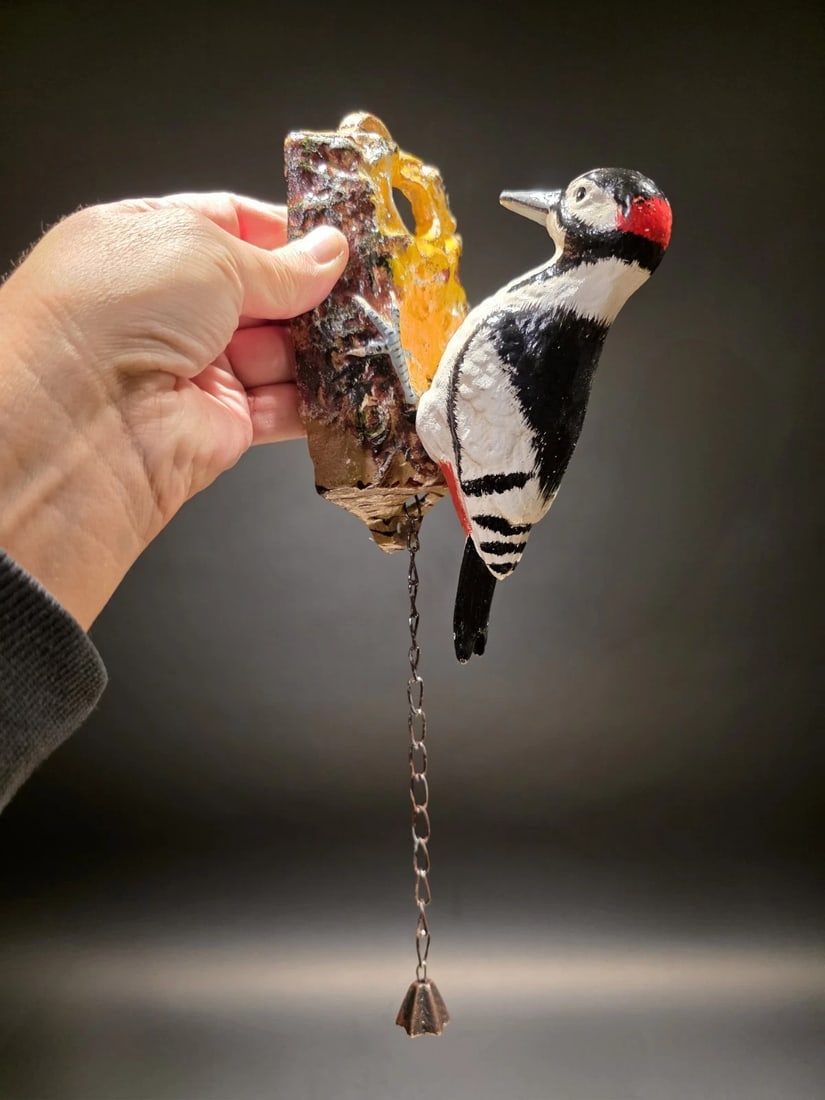 Folk Art Cast Iron Woodpecker Door Knocker: Title: Folk Art Cast Iron Woodpecker Door Knocker Description: Vintage Style Cast Iron Woodpecker Door Knocker Add a whimsical touch to your entryway with this delightful mechanical door knocker. Feat