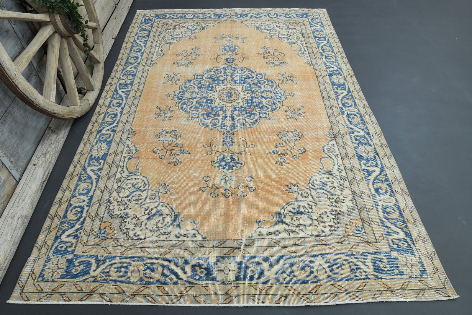 6.5x9.5 Orange Area Rug: Title: 6.5x9.5 Orange Area Rug Description: This Turkish one-of-a-kind Vintage Turkish Rug is hand-knotted and handwoven by the most skilled artisans who use pure wool, in muted, natural tones, and st