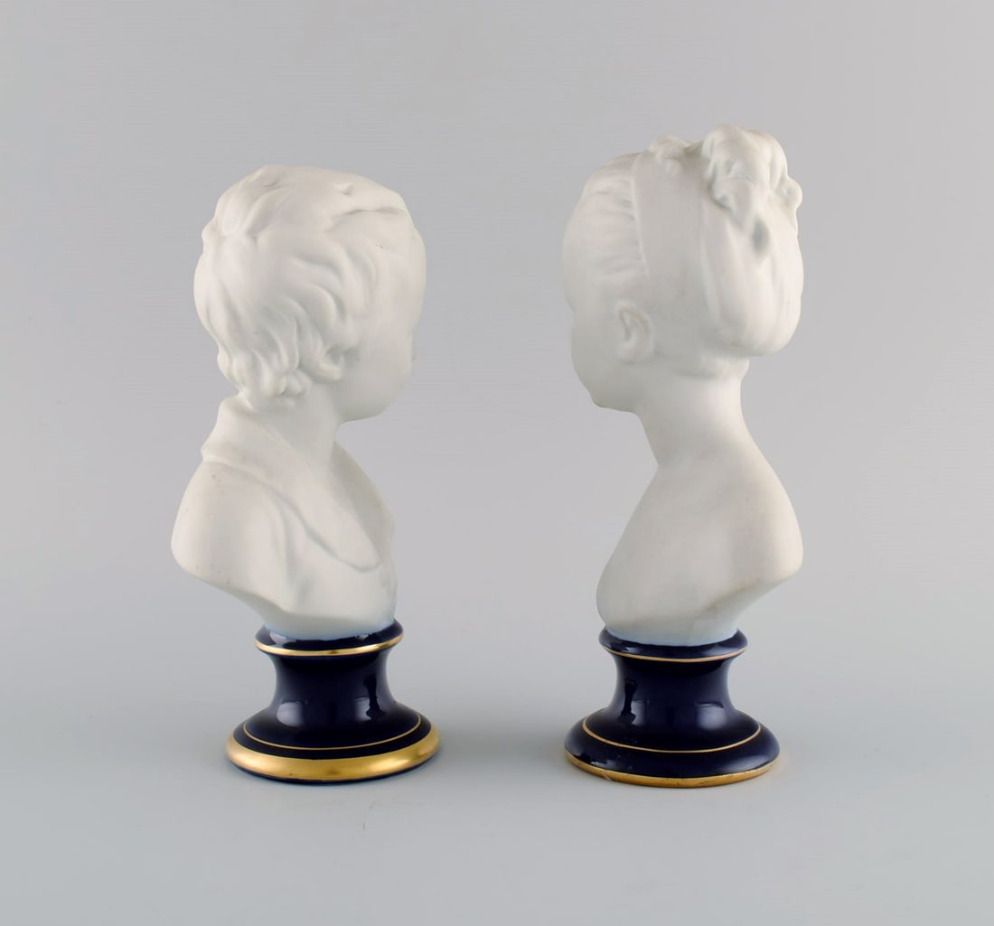 Limoges France. Two child busts in biscuit. Stand with dark blue glaze and gold edges. Classic - 3