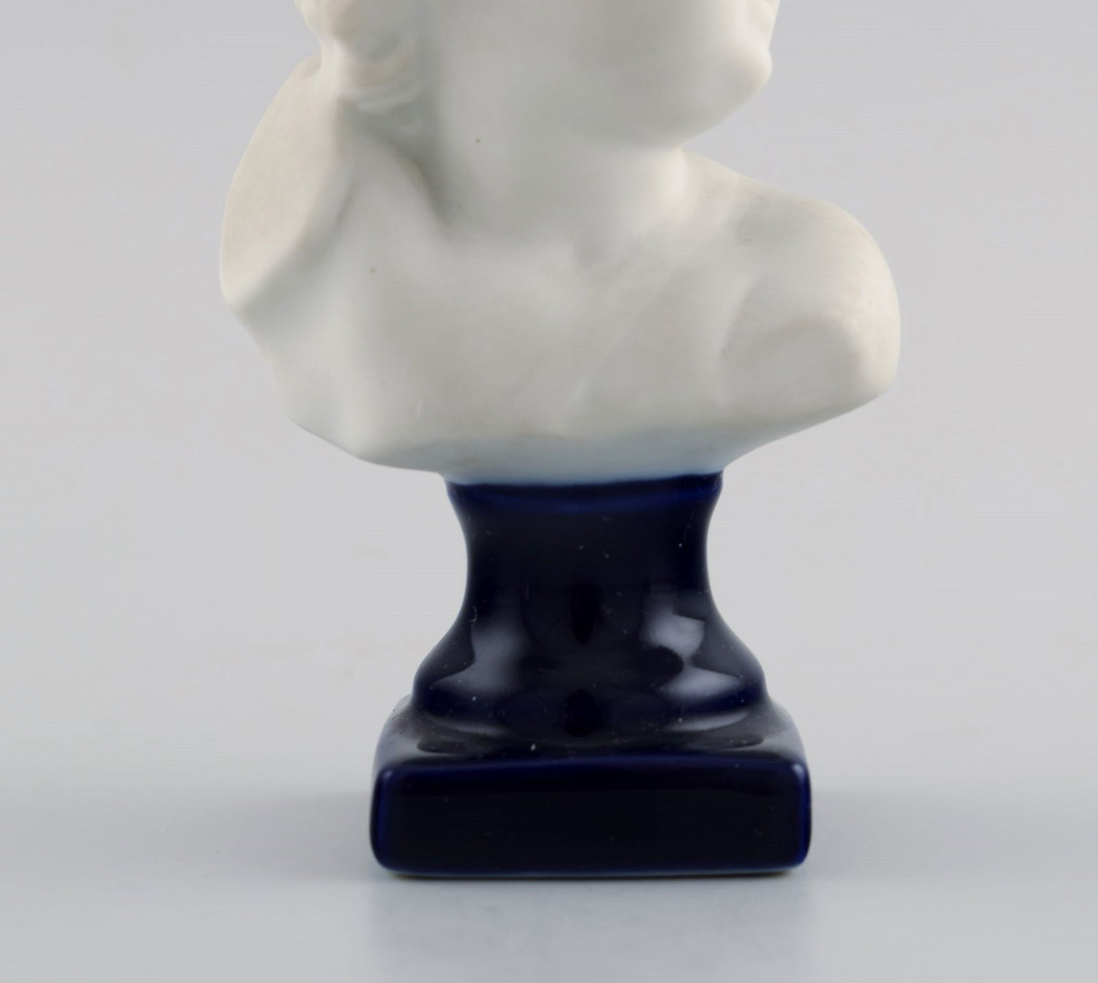 Limoges France. Biscuit child bust. Stand with dark blue glaze. Classic style. Early 20th century. - 7