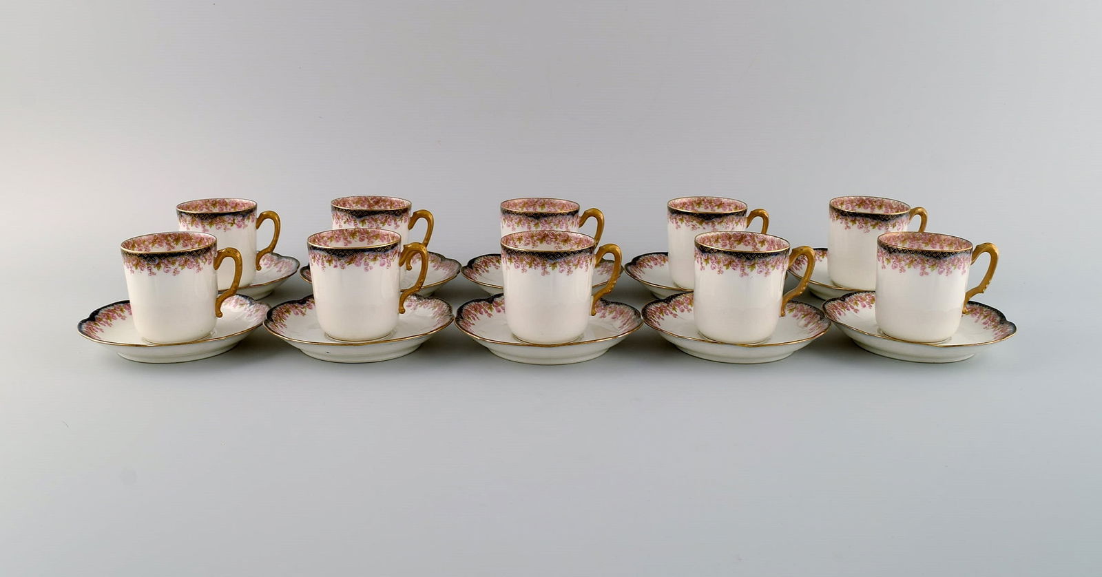 Limoges, France. 10 mocha cups with saucers in hand-painted porcelain. Pink flowers and gold edge. (1 of 6)