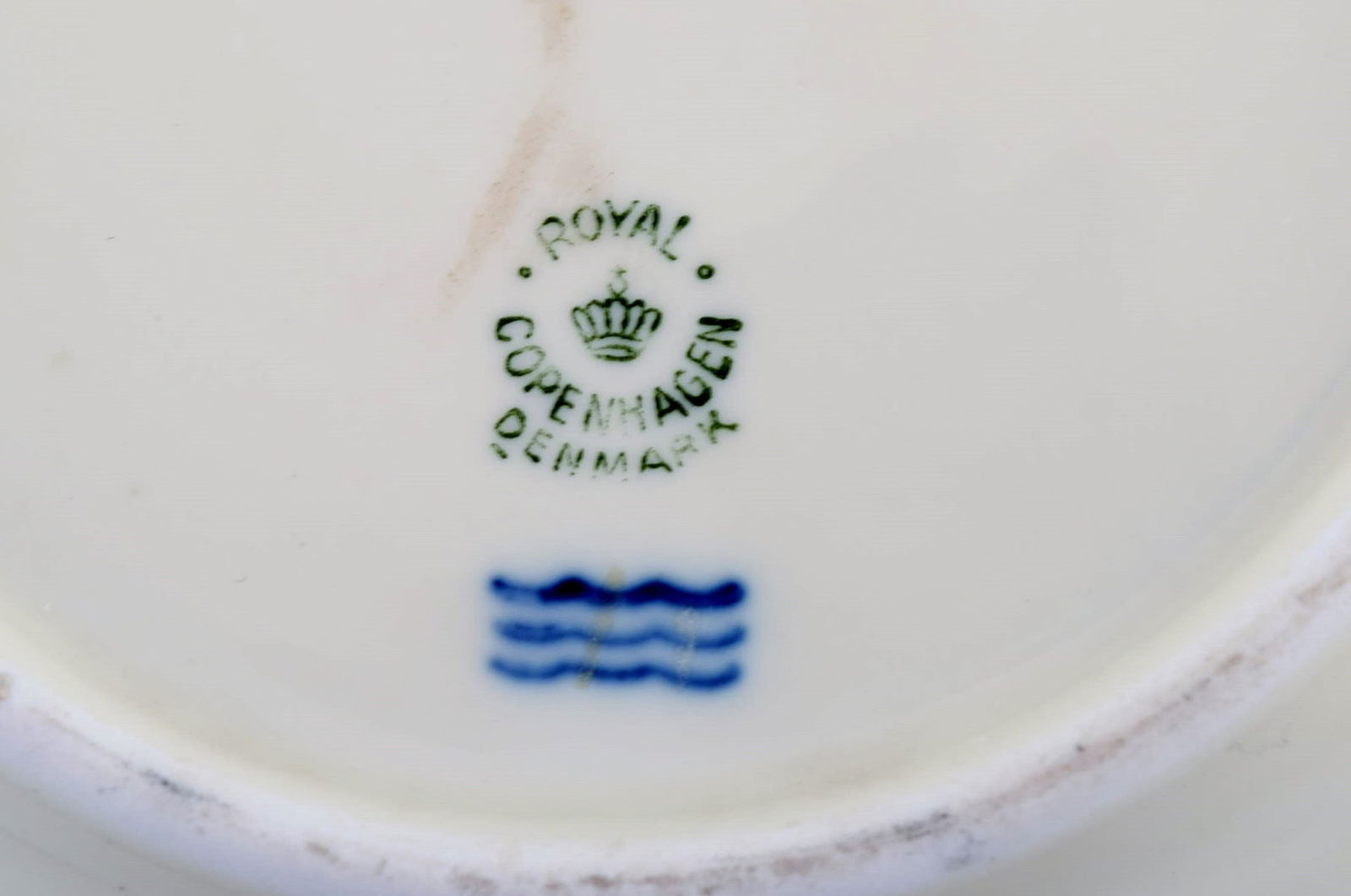 Three Royal Copenhagen bowls decorated with flowers and romantic scenery. Gold decoration. Mid-20th - 6