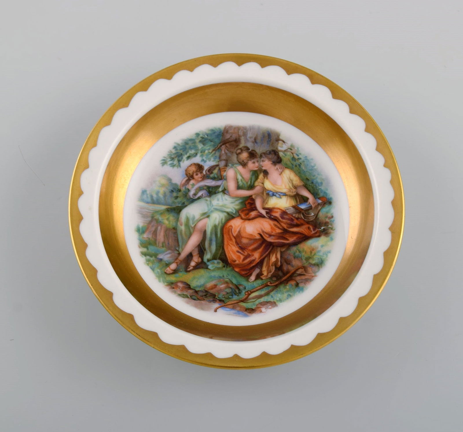 Three Royal Copenhagen bowls decorated with flowers and romantic scenery. Gold decoration. Mid-20th - 7