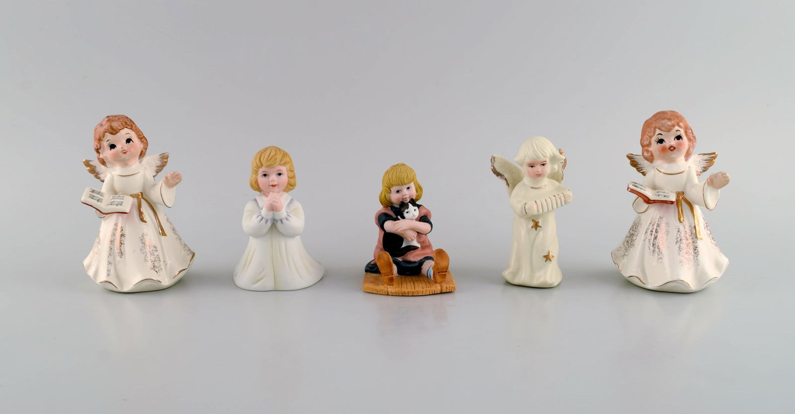 Five porcelain figurines. Angels and children. 1980s. (1 of 9)