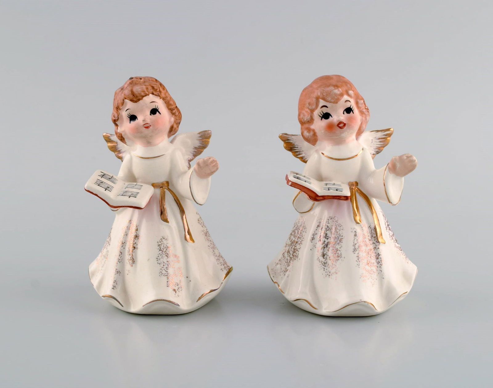Five porcelain figurines. Angels and children. 1980s. - 2