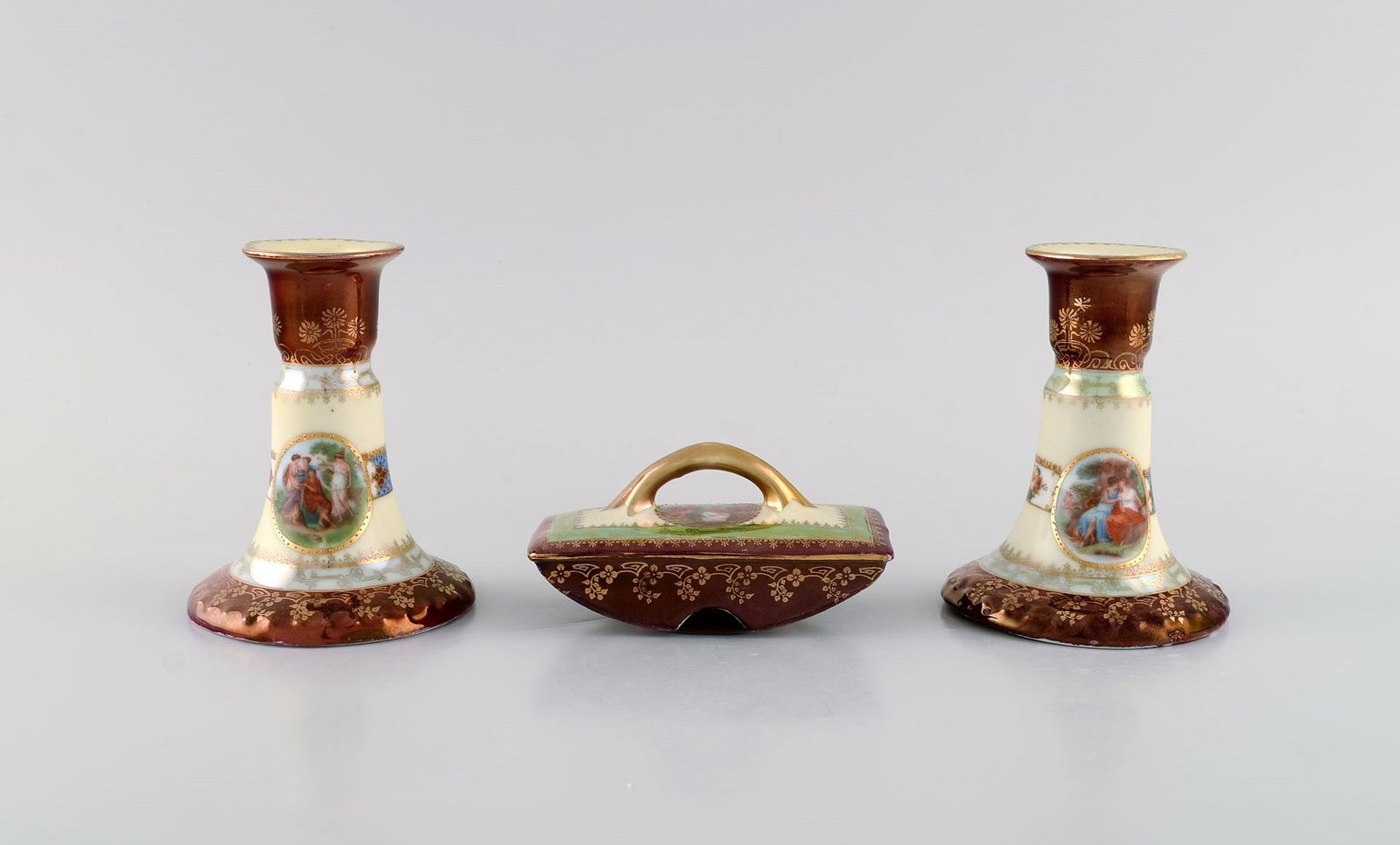 Two candlesticks and ink dryer in hand-painted porcelain. Romantic scenes and gold decoration. (1 of 8)