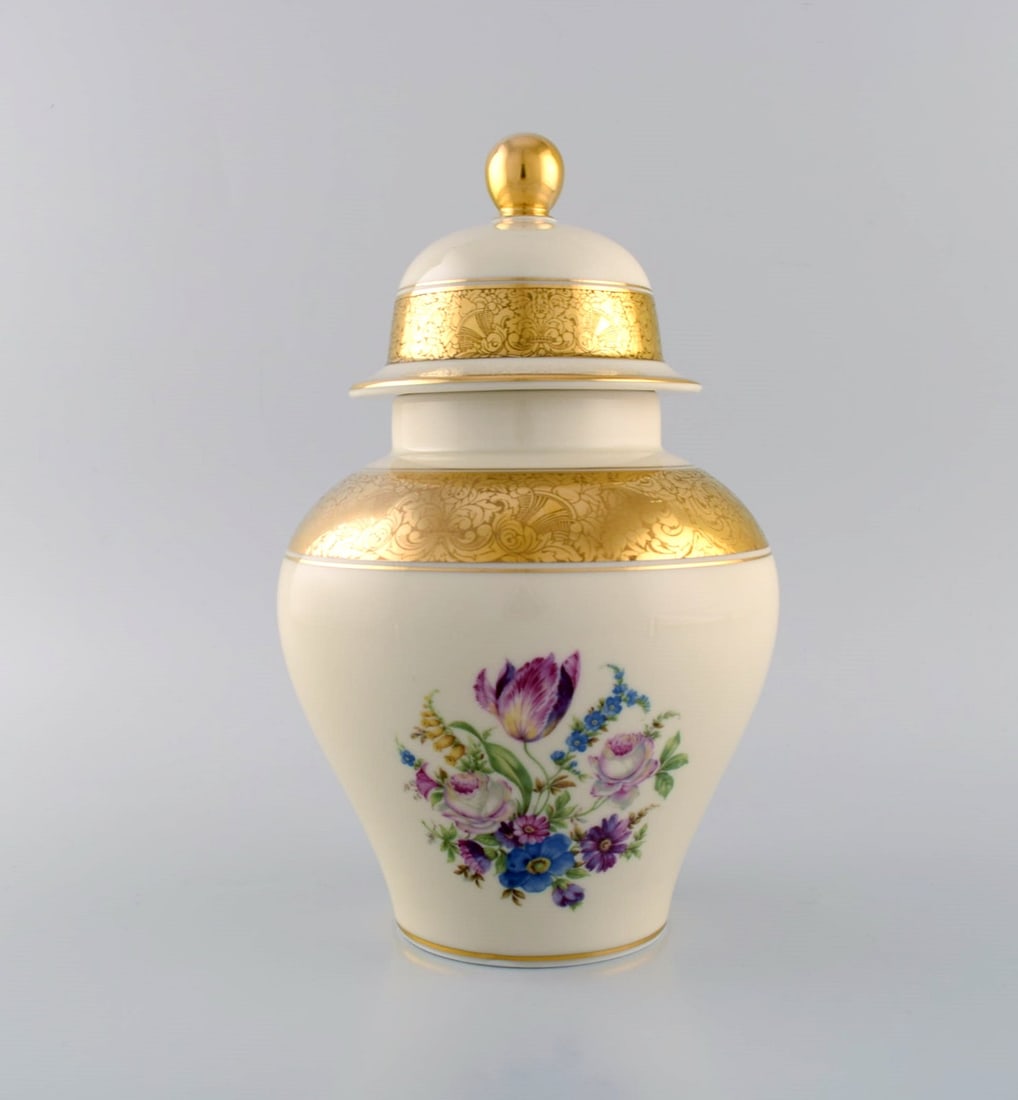 Rosenthal lidded vase in cream-colored porcelain with hand-painted flowers and gold leaf decoration. (1 of 5)