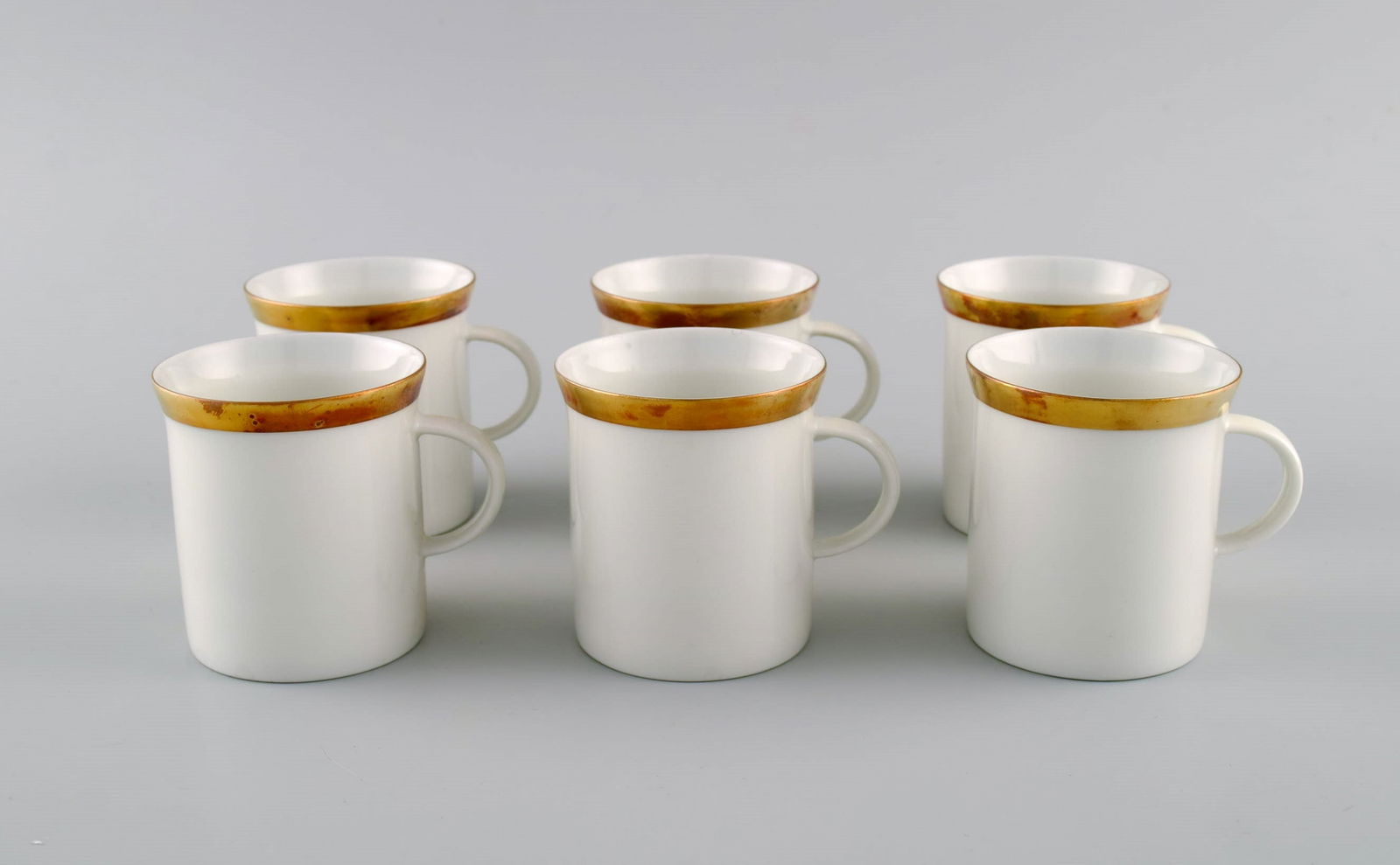Six Rosenthal Berlin coffee cups in porcelain with gold edge. Mid-20th century.: Title: Six Rosenthal Berlin coffee cups in porcelain with gold edge. Mid-20th century. Description: Six Rosenthal Berlin coffee cups in porcelain with gold edge. Mid-20th century. Measures: 7 x 6.5