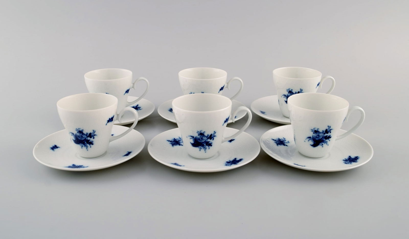 Bjørn Wiinblad for Rosenthal. Six Romanze Blue Flower mocha cups with saucers. 1960s. (1 of 5)