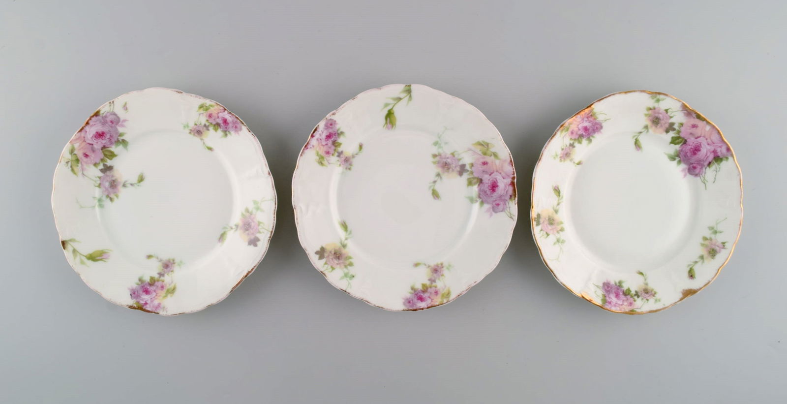 Rosenthal, Germany. Three Iris plates in hand-painted porcelain with flowers and gold edge. 1920s. (1 of 4)