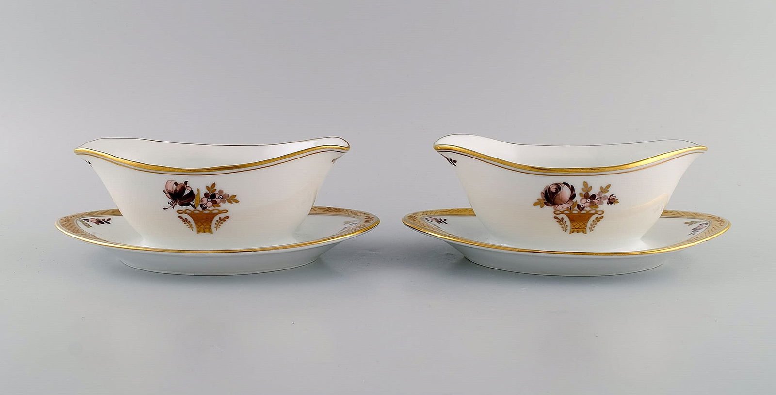 Two Royal Copenhagen Golden Basket sauce bowls in porcelain with flowers and gold decoration. Model (1 of 6)