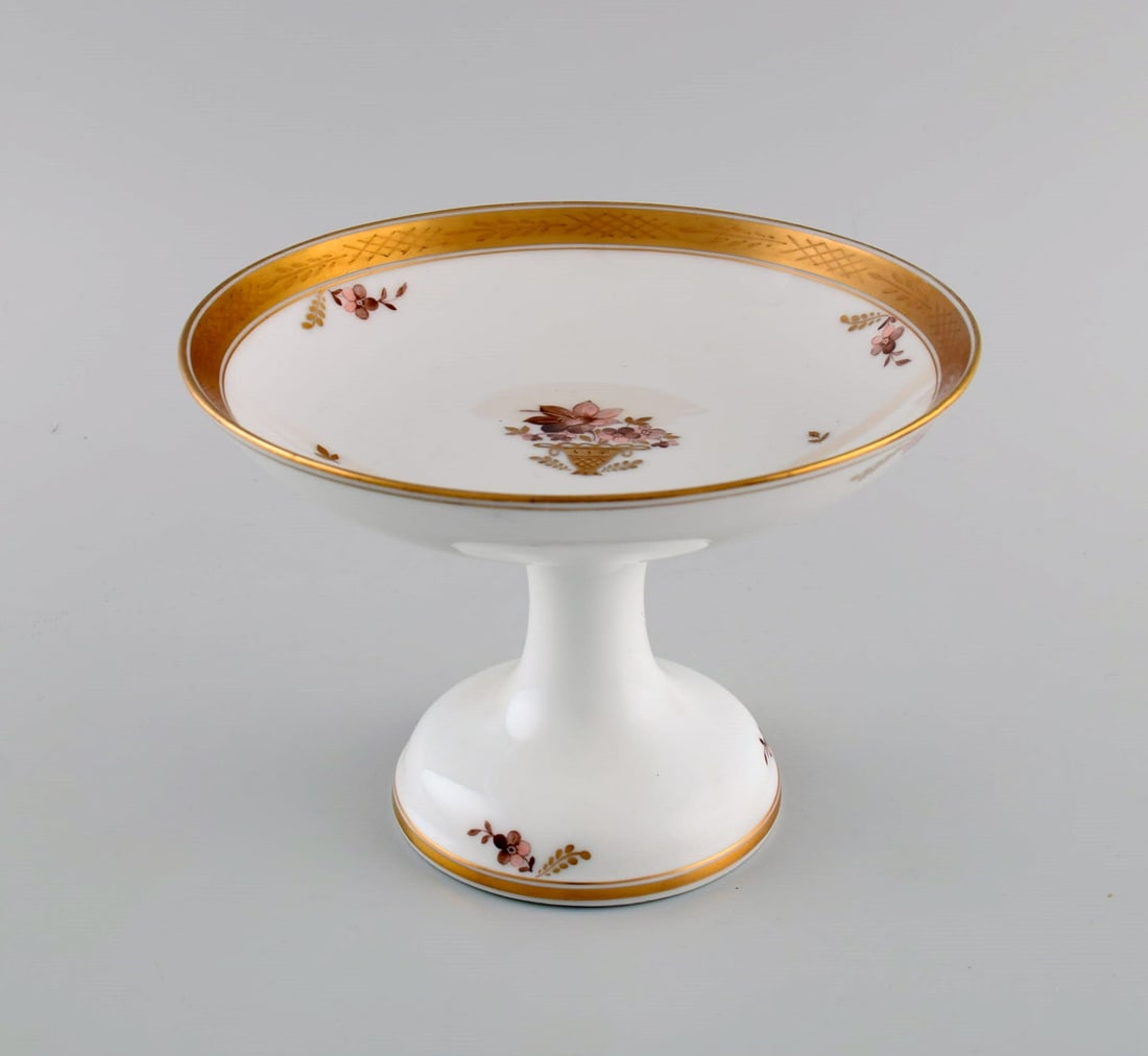 Royal Copenhagen Golden basket compote in porcelain with flowers and gold decoration. Model number - 2