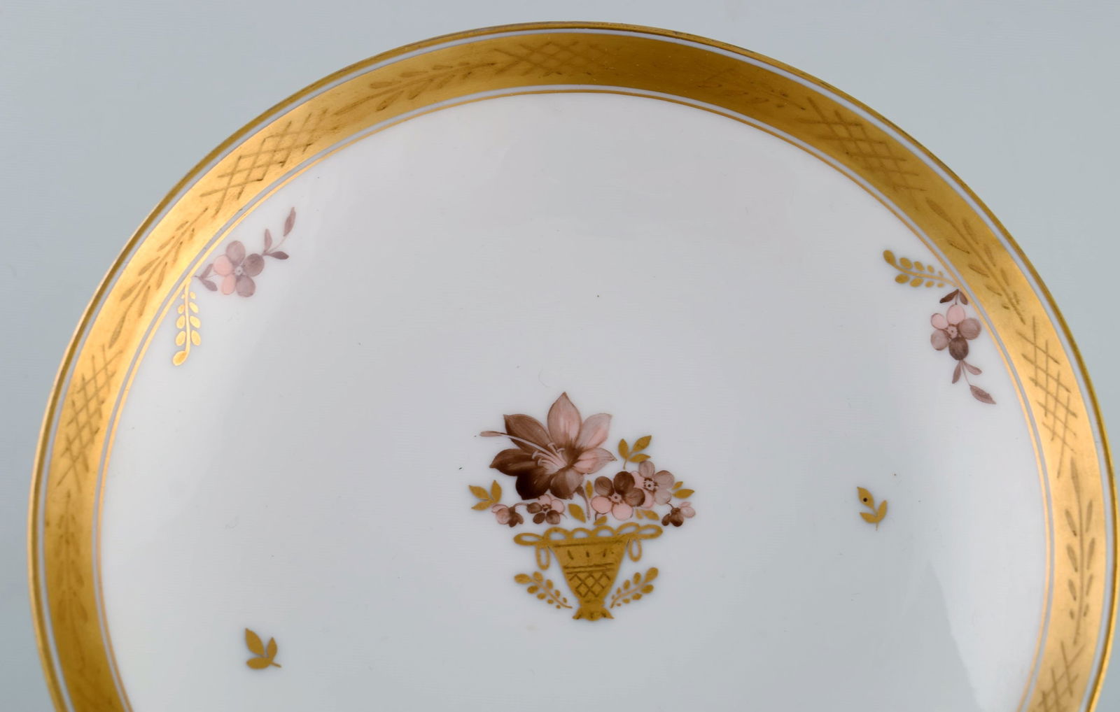 Royal Copenhagen Golden basket compote in porcelain with flowers and gold decoration. Model number - 4