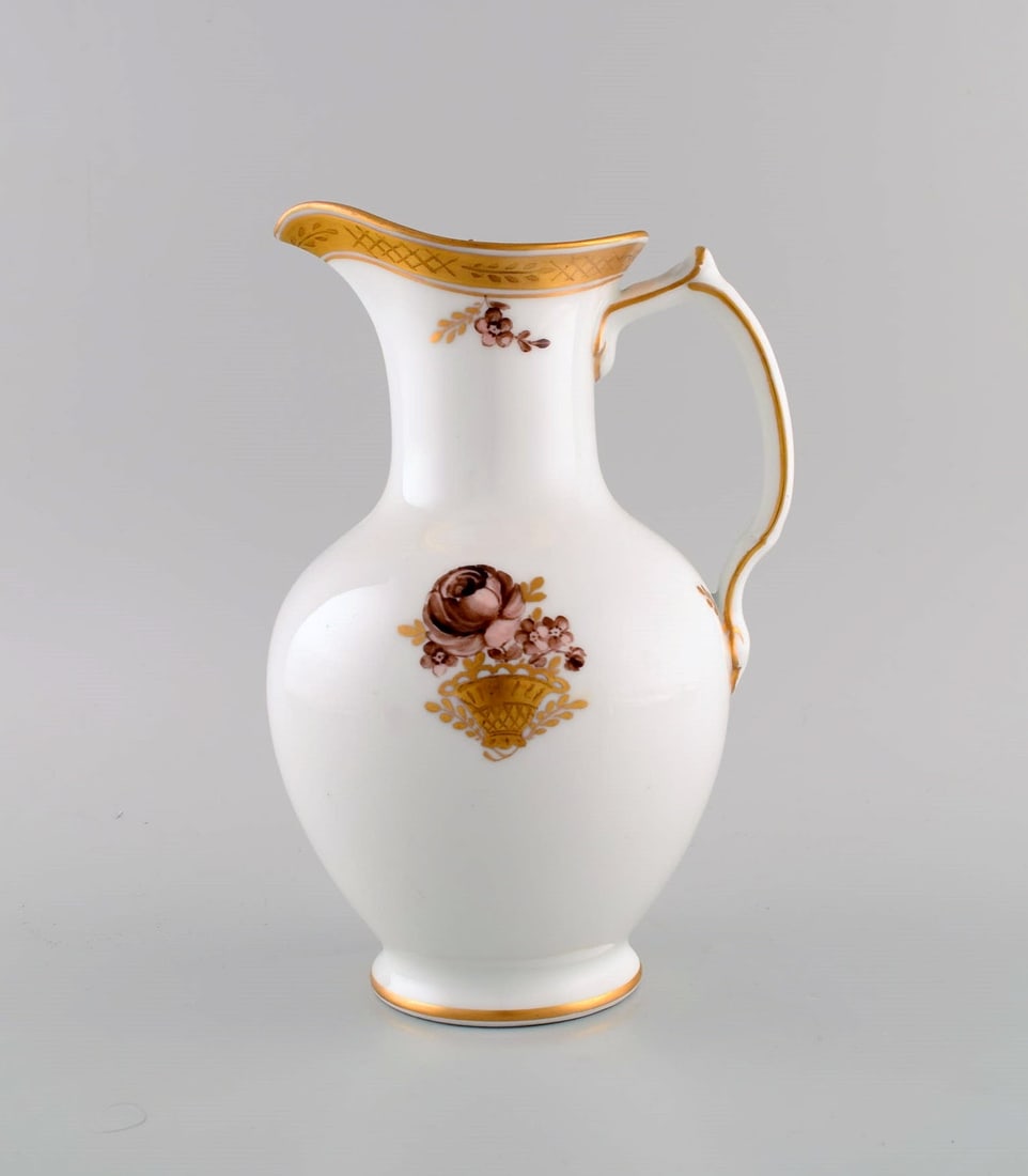 Royal Copenhagen Golden Basket chocolate jug in porcelain with flowers and gold decoration. Model (1 of 6)