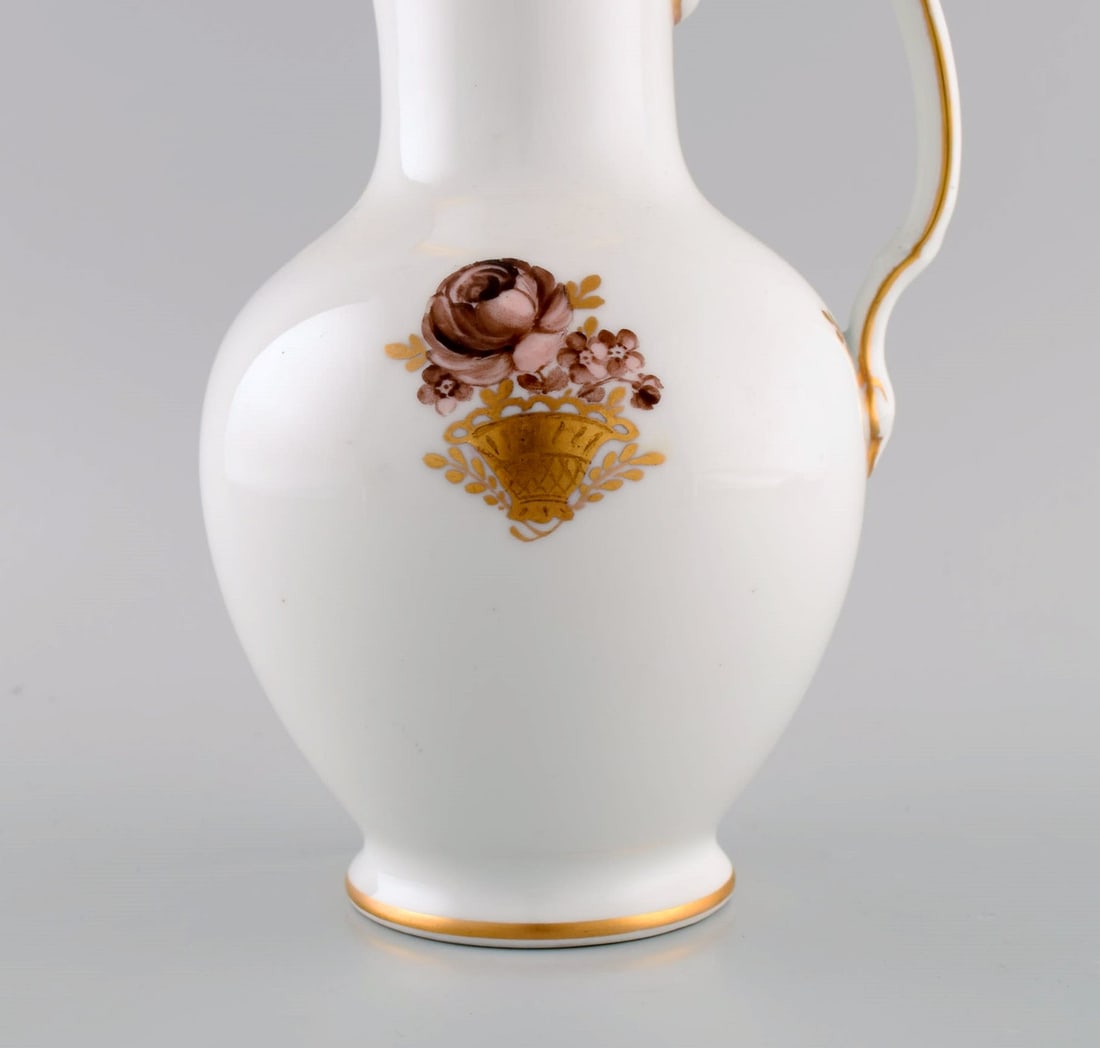 Royal Copenhagen Golden Basket chocolate jug in porcelain with flowers and gold decoration. Model - 3