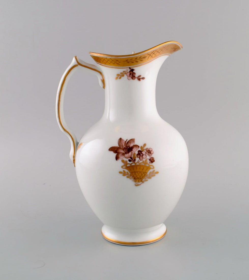 Royal Copenhagen Golden Basket chocolate jug in porcelain with flowers and gold decoration. Model - 4