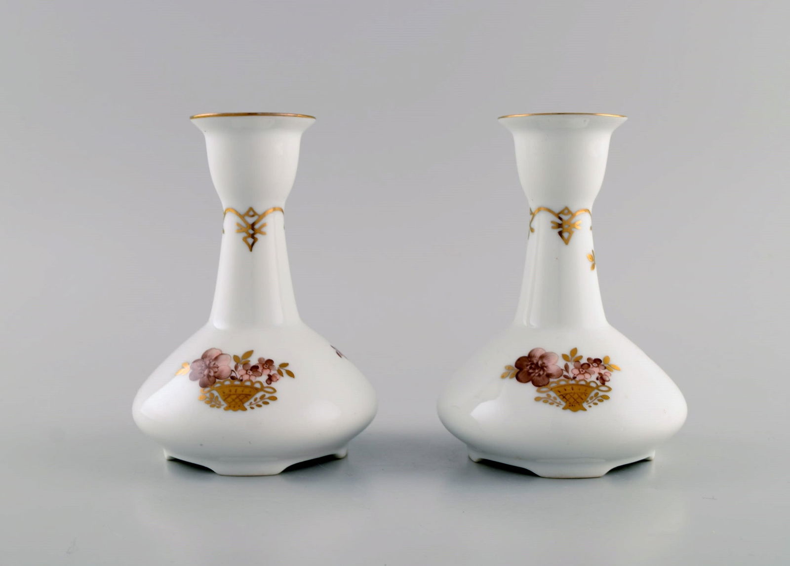 Two Royal Copenhagen Golden Basket candlesticks in porcelain with flowers and gold decoration. Model - 2