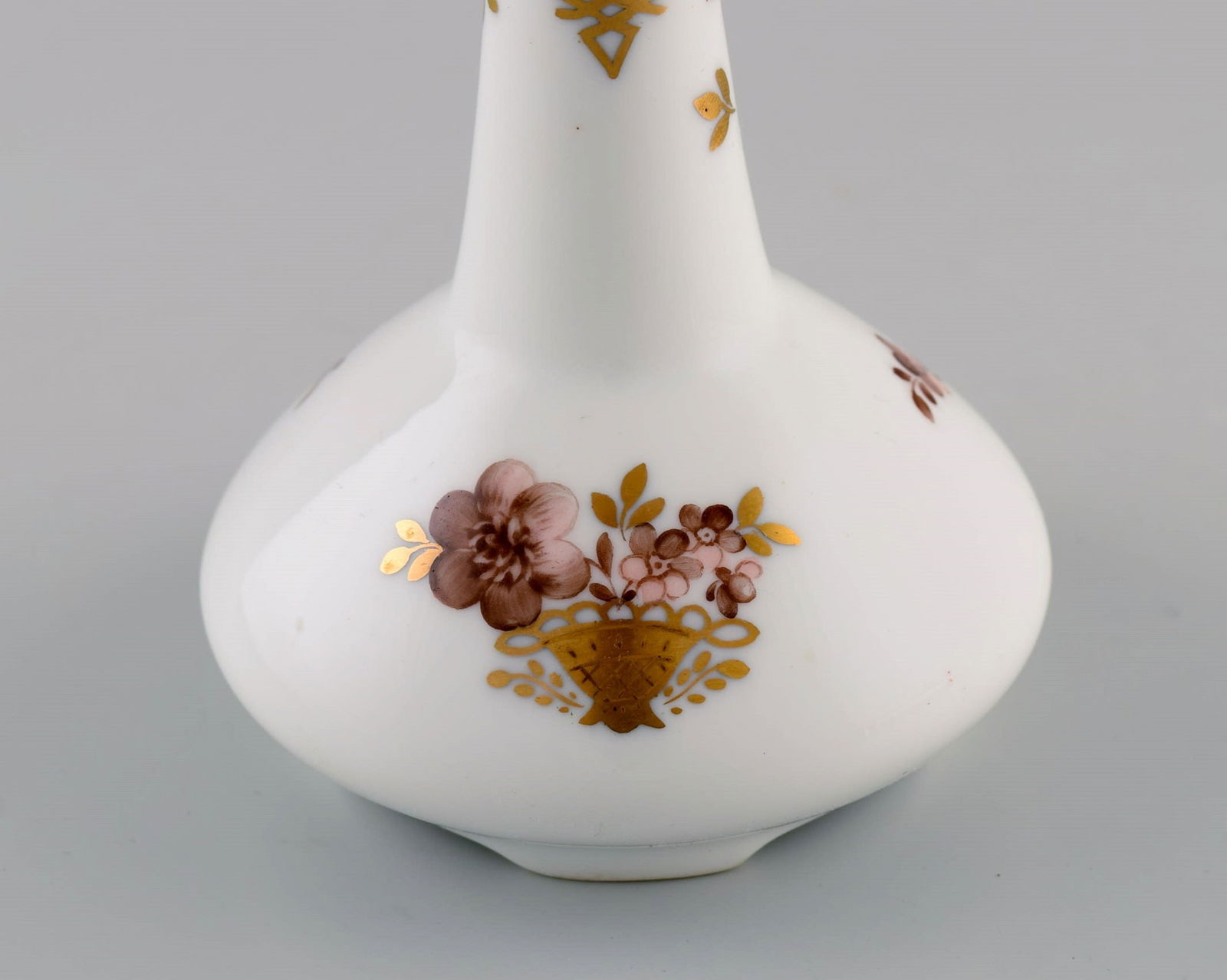 Two Royal Copenhagen Golden Basket candlesticks in porcelain with flowers and gold decoration. Model - 4