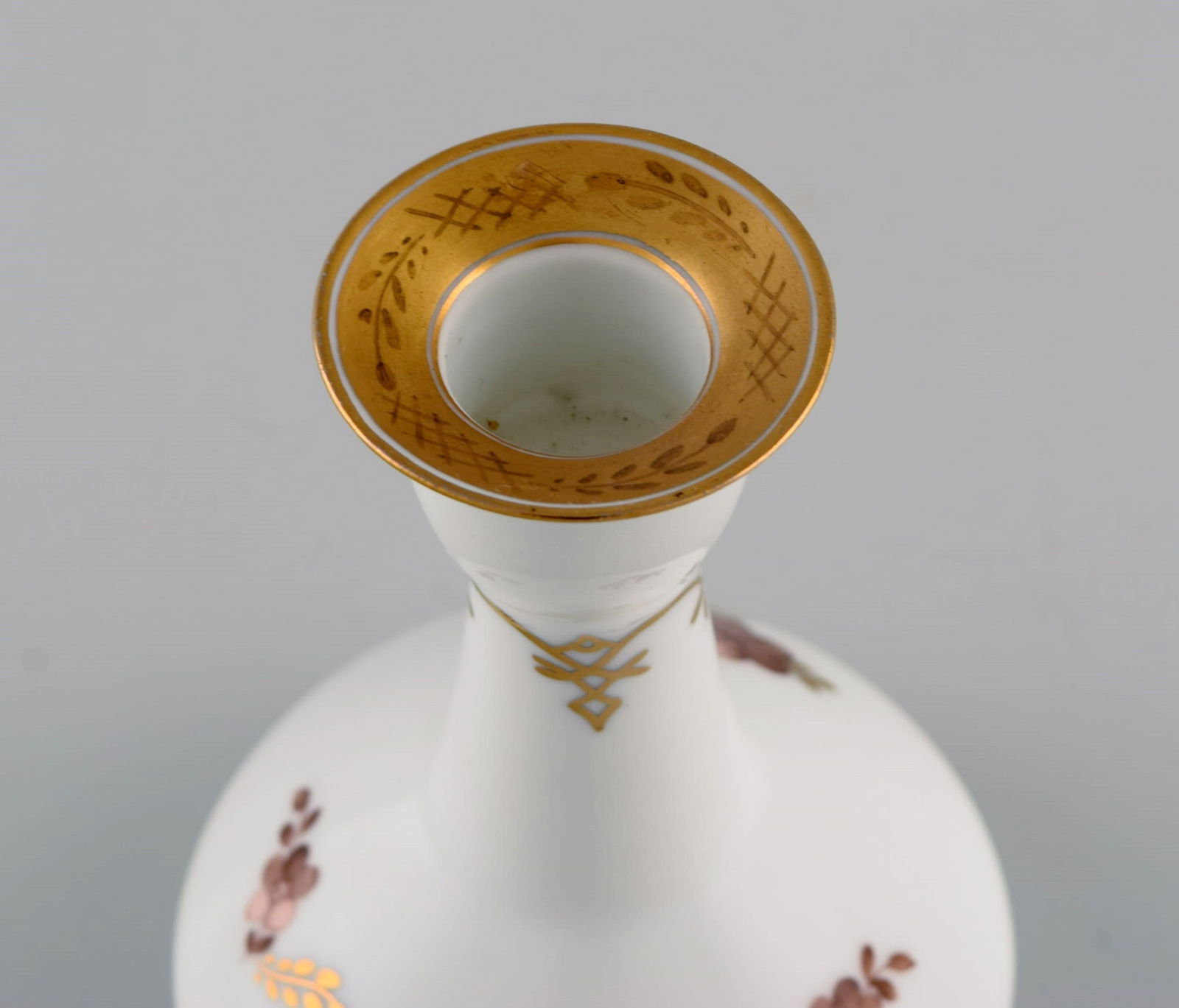 Two Royal Copenhagen Golden Basket candlesticks in porcelain with flowers and gold decoration. Model - 6