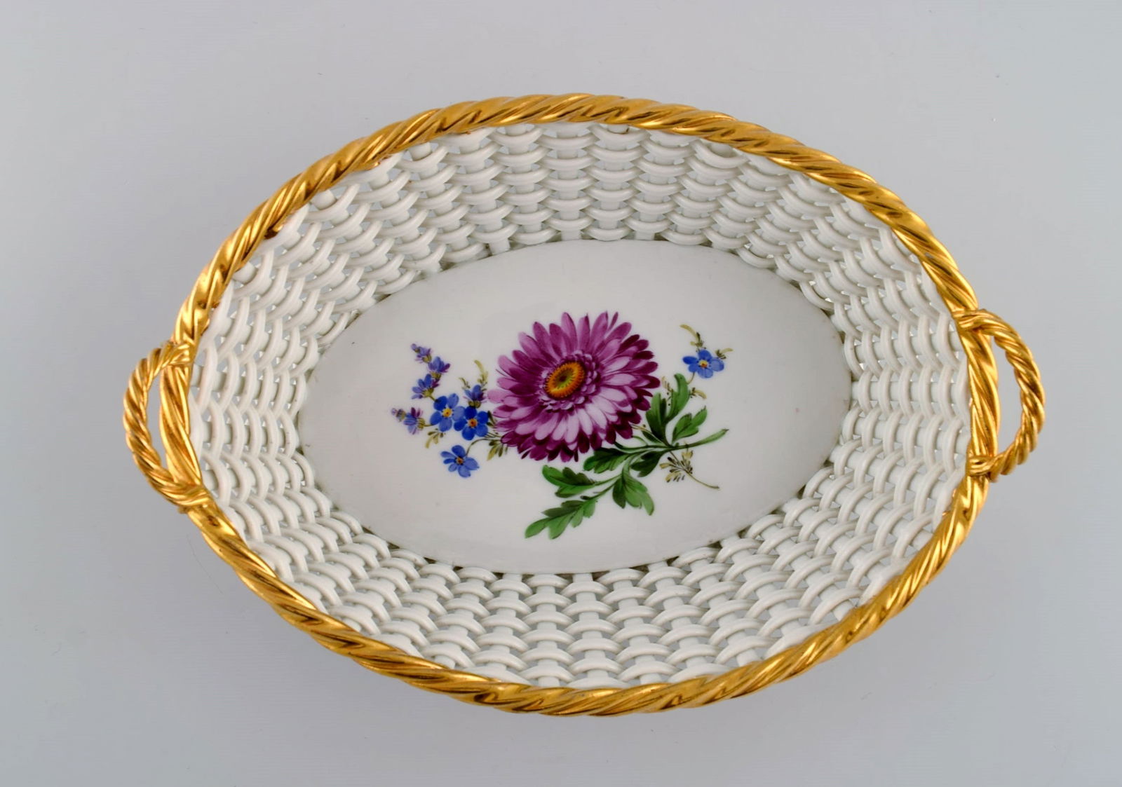 Antique Meissen braided porcelain basket with handles. Hand-painted flowers and golden border. Late: Title: Antique Meissen braided porcelain basket with handles. Hand-painted flowers and golden border. Late 19th century. Description: Antique Meissen braided porcelain basket with handles. Hand-painte