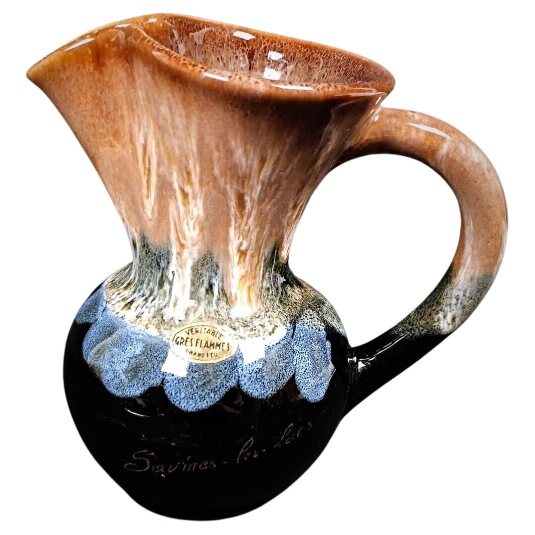 Pitcher "Savines les Lacs" Genuine High-Fired Flame Glazed Stoneware: Title:Pitcher "Savines les Lacs" Genuine High-Fired Flame Glazed StonewareOrigin:FranceDimension:Height: 17 cm (6.7 inches)Length: 16 cm (6.3 inches)Diameter: 11 cm (4.3