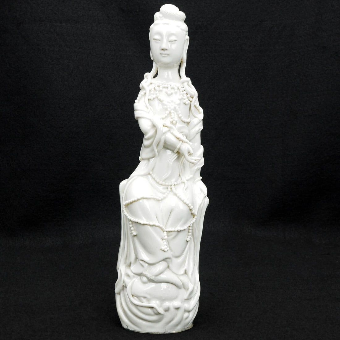 Chinese Blanc De Chine Guanyin Qing/Republic: Title:Chinese Blanc De Chine Guanyin Qing/RepublicSize:9 ½ in (24.1 cm) tall x 2 ¾ in (7.0 cm) wide x 2 in (5.1 cm) deep. Reserve: $145.00 Shipping:Domestic: Flat-rate of $16.00 to