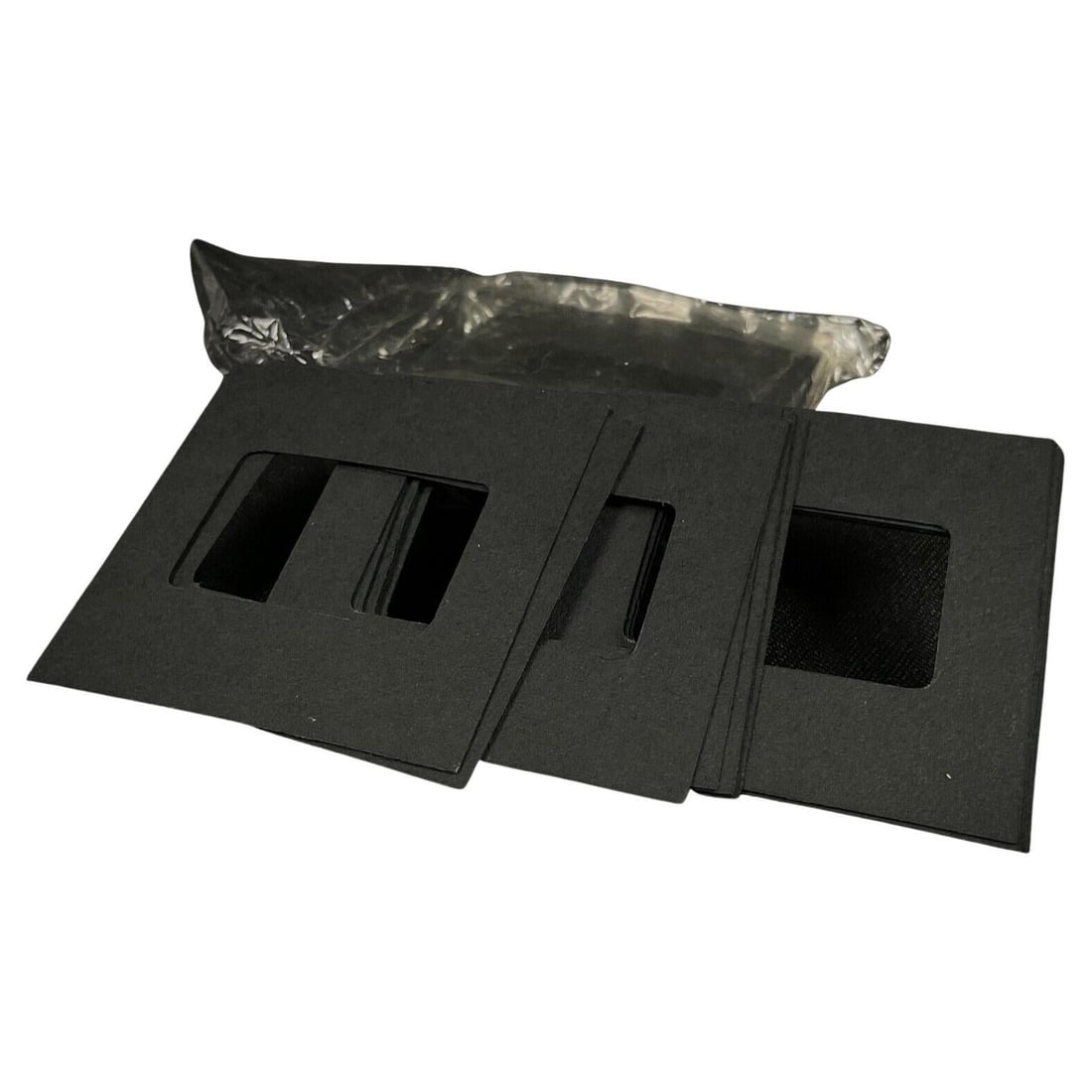 Vintage Set of 20 Black Slide Paper with 20 Covers: Title:Vintage Set of 20 Black Slide Paper with 20 CoversOrigin:FranceDimension:3.94 in (10 cm)Width: 3.94 in (10 cm)Depth: 0.12 in (3 mm)Materials:PaperYear:20th CenturyDescription:This vintage set