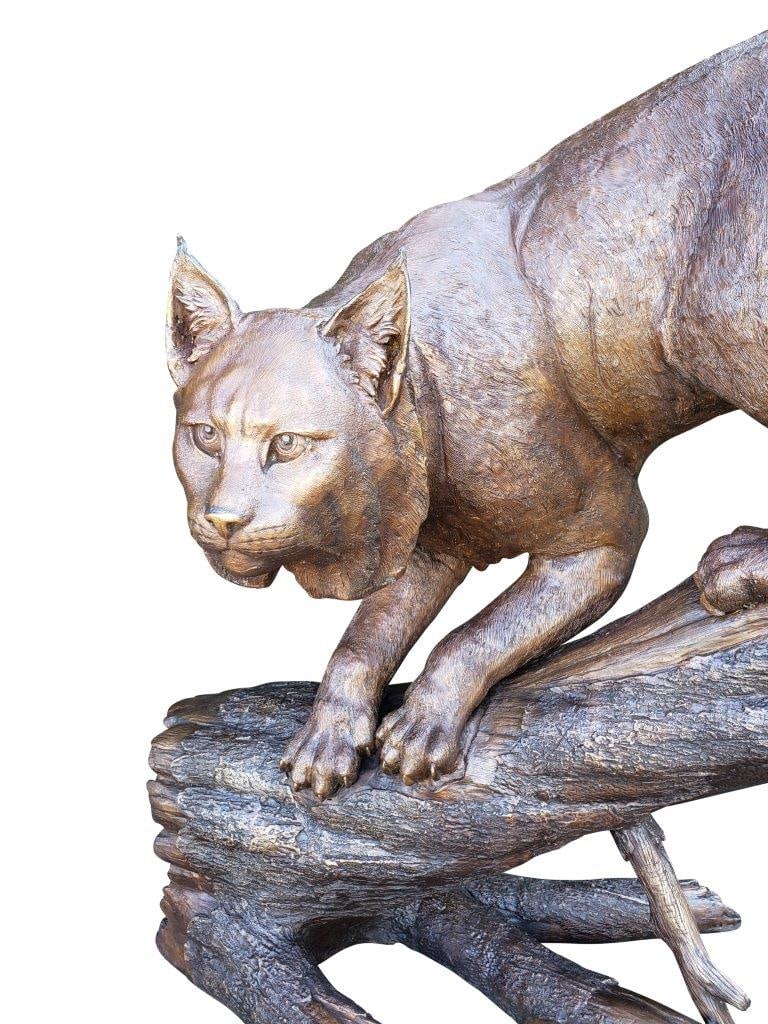 Bobcat Going Down a Tree Log Bronze Statue - Size: 43"L x 25"W x 41"H. - 8