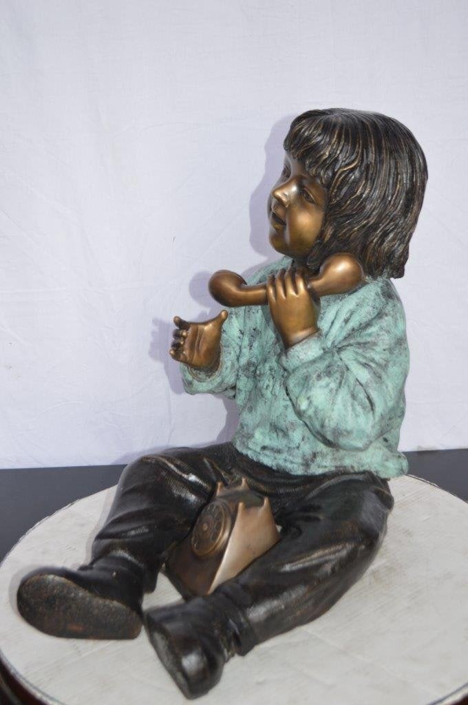 Young Child With an Old Telephone Bronze Statue - Size: 21"L x 14"W x 19"H. - 11