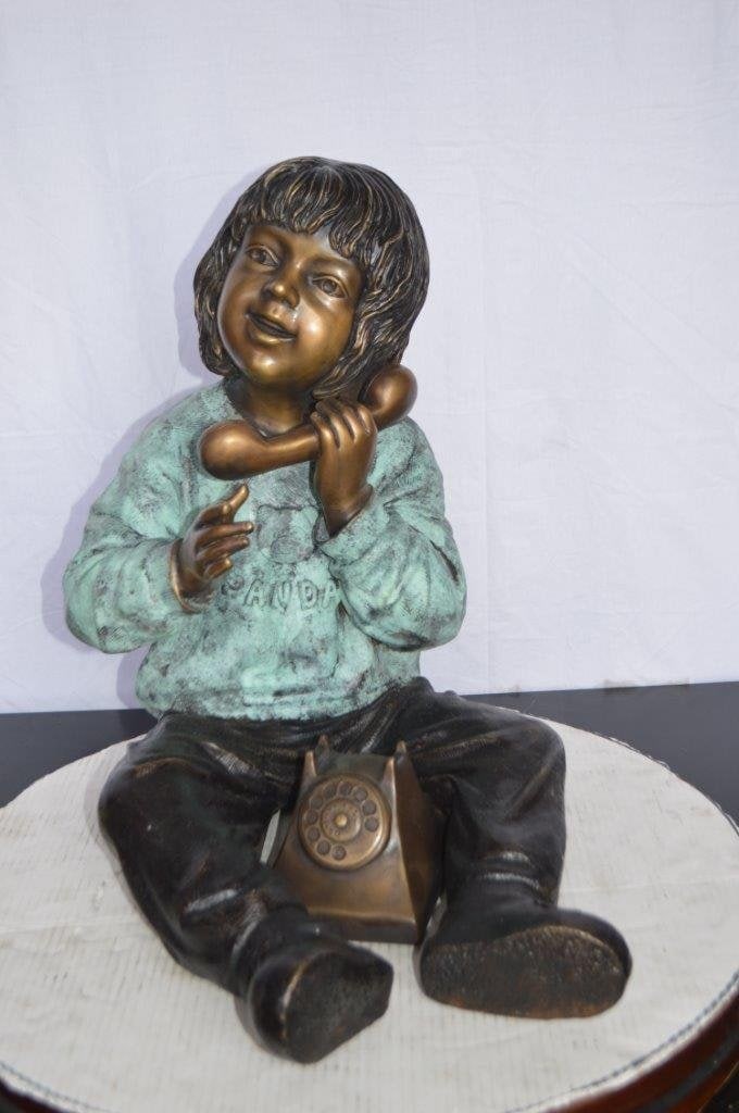 Young Child With an Old Telephone Bronze Statue - Size: 21"L x 14"W x 19"H. - 12