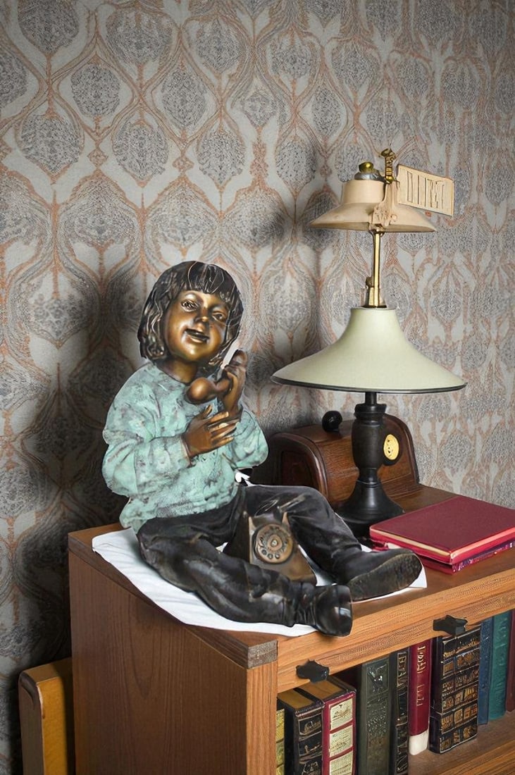 Young Child With an Old Telephone Bronze Statue - Size: 21"L x 14"W x 19"H. - 2