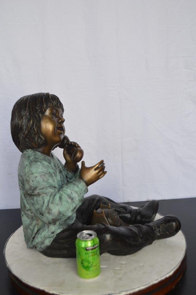 Young Child With an Old Telephone Bronze Statue - Size: 21"L x 14"W x 19"H. - 5