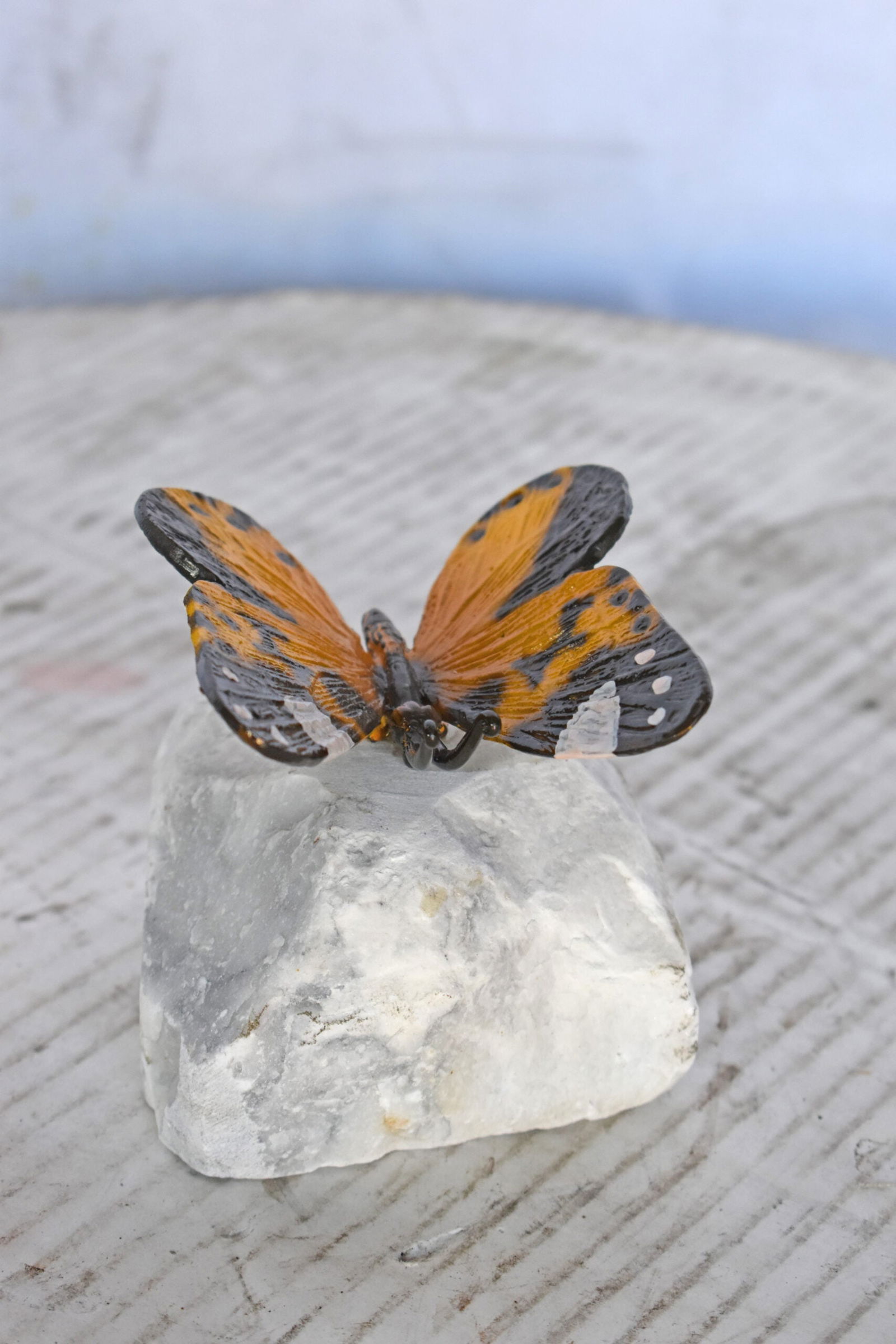 Orange Butterfly made of Bronze mounted on a rock - Size: 5"L x 5"W x 4"H. - 10