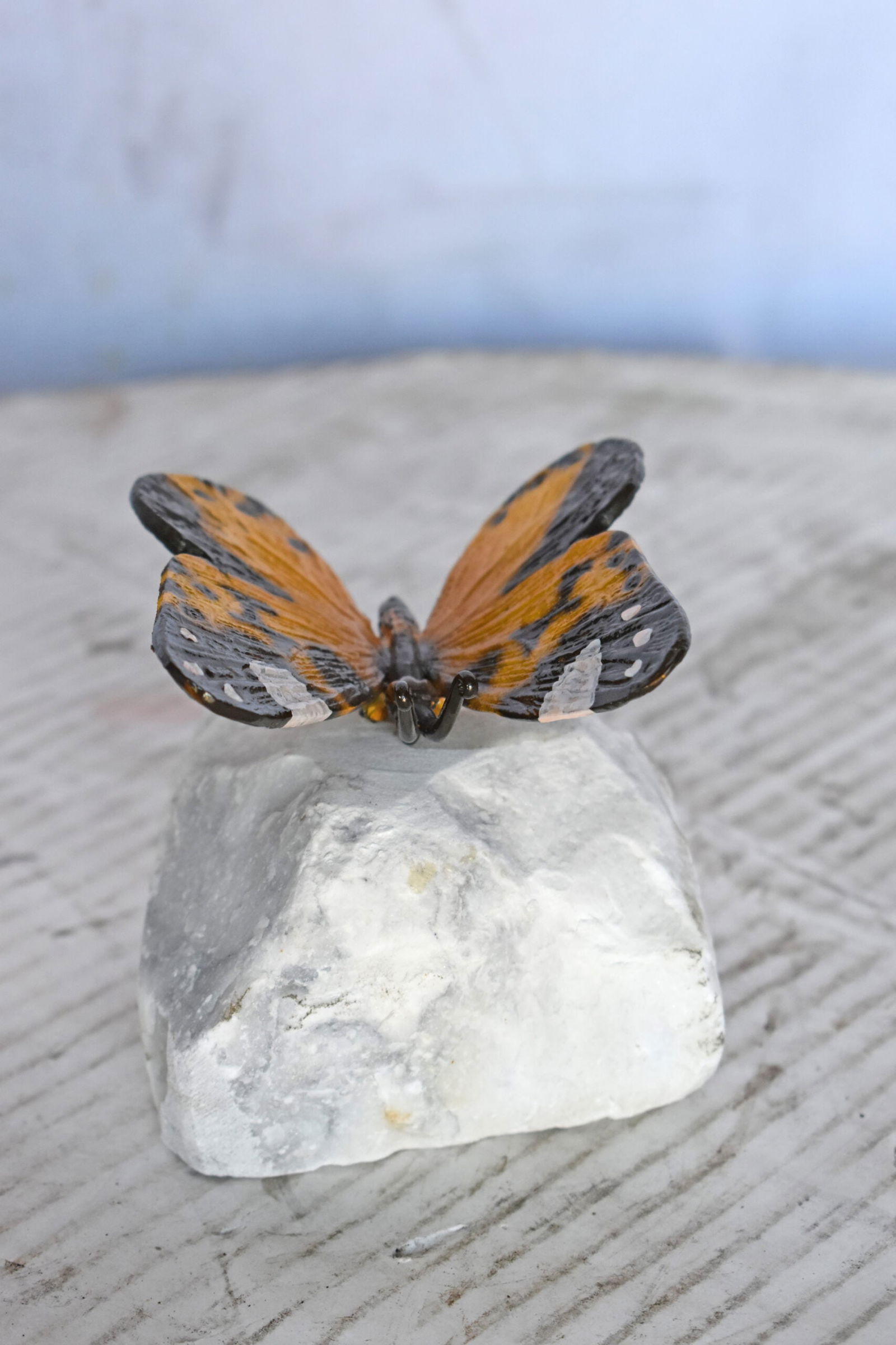 Orange Butterfly made of Bronze mounted on a rock - Size: 5"L x 5"W x 4"H. - 2