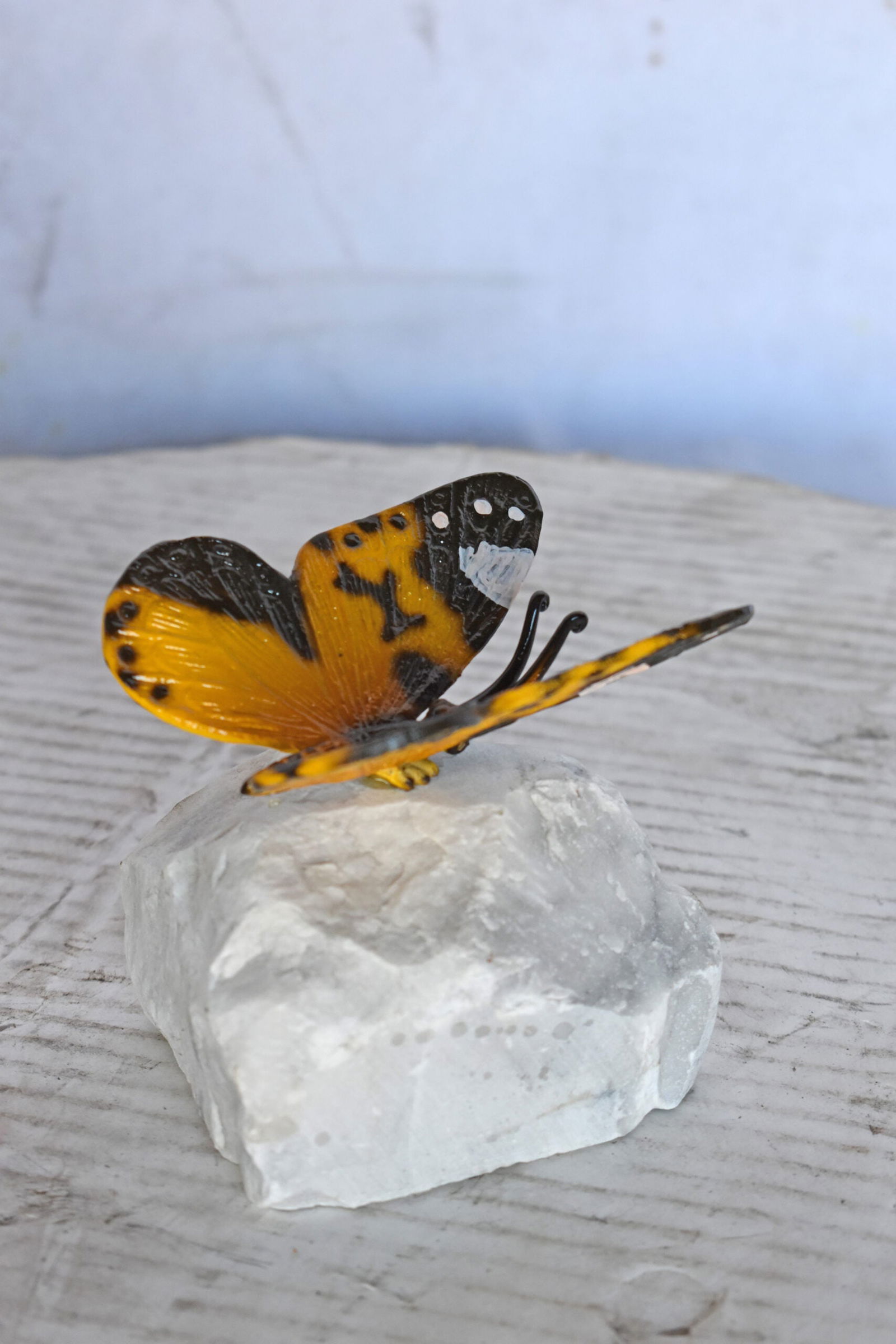 Orange Butterfly made of Bronze mounted on a rock - Size: 5"L x 5"W x 4"H. - 5