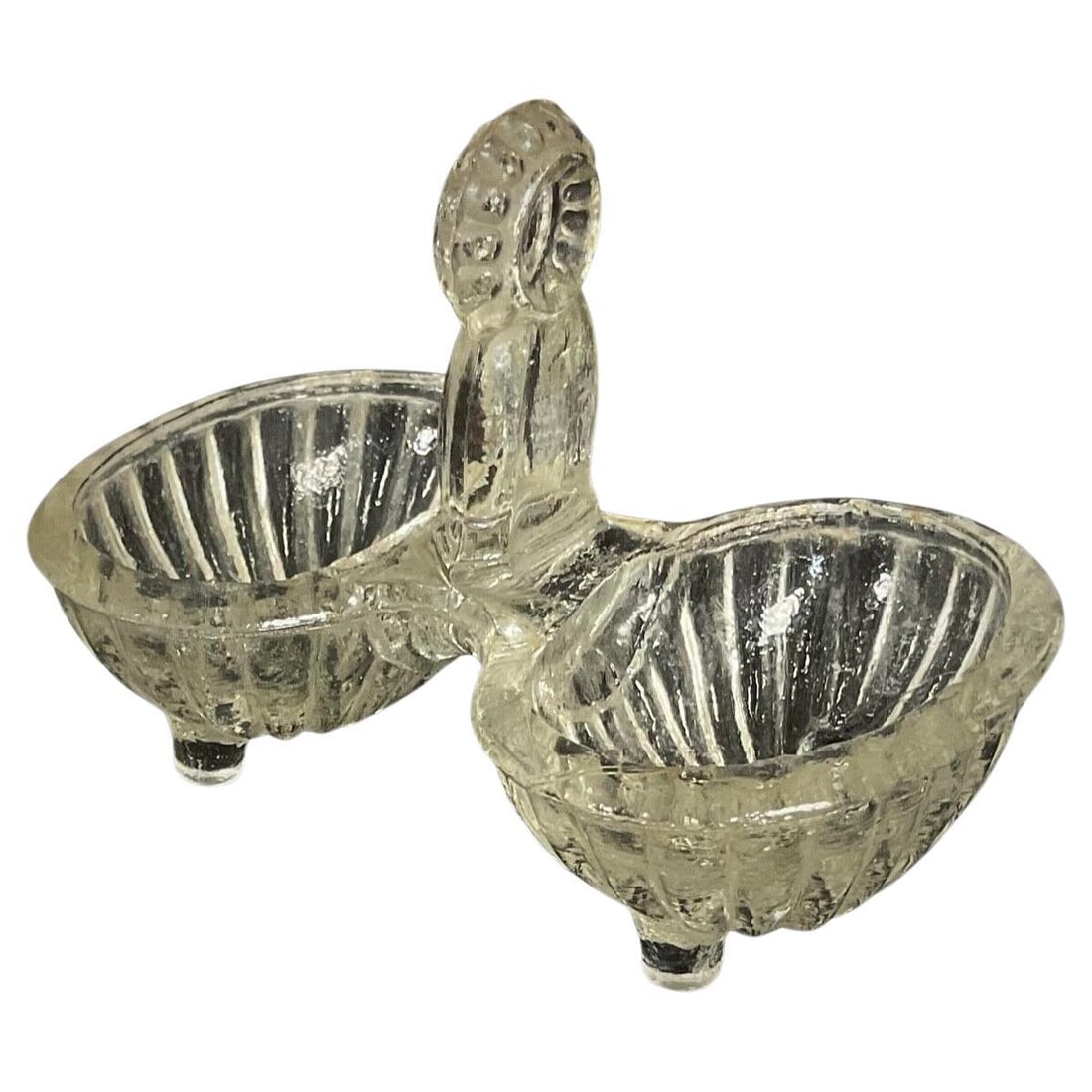 Antique 20th-Century French Quadruple-Footed Glass Salt Cellar: Title:Antique 20th-Century French Quadruple-Footed Glass Salt Cellar Origin:FranceDimension:Height: 3.15 in (8 cm)Width: 2.76 in (7 cm)Depth: 4.34 in (11 cm)Materials:GlassYear:Early 20th