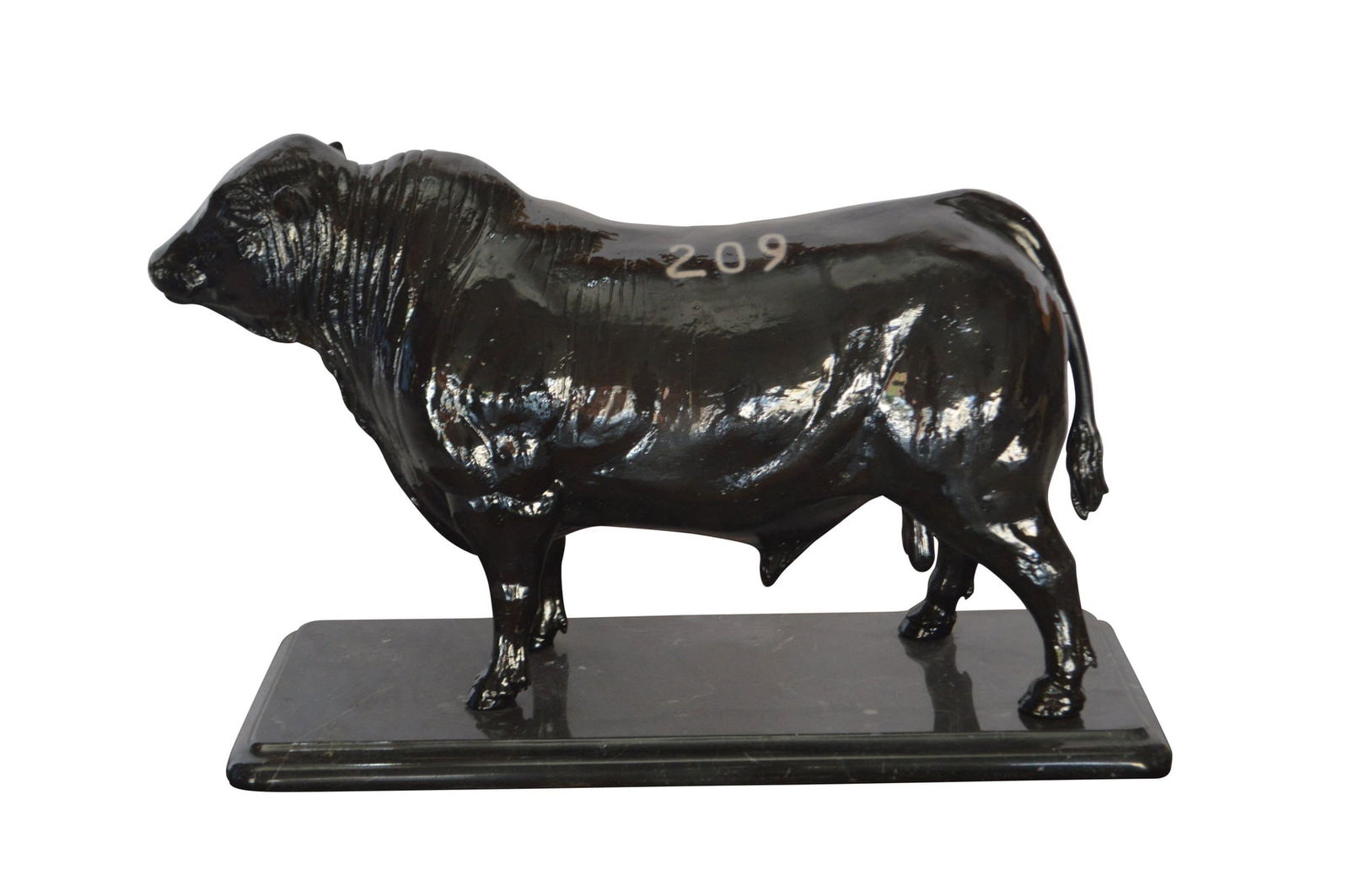 Bull Standing on a Marble base Bronze Statue - Size: 19"L x 8"W x 13"H.: Title:Bull Standing on a Marble base Bronze Statue - Size: 19"L x 8"W x 13"H. Description:A beautiful bronze statue of Bull Standing on a Marble base with the number 209 written on him. This is a grea