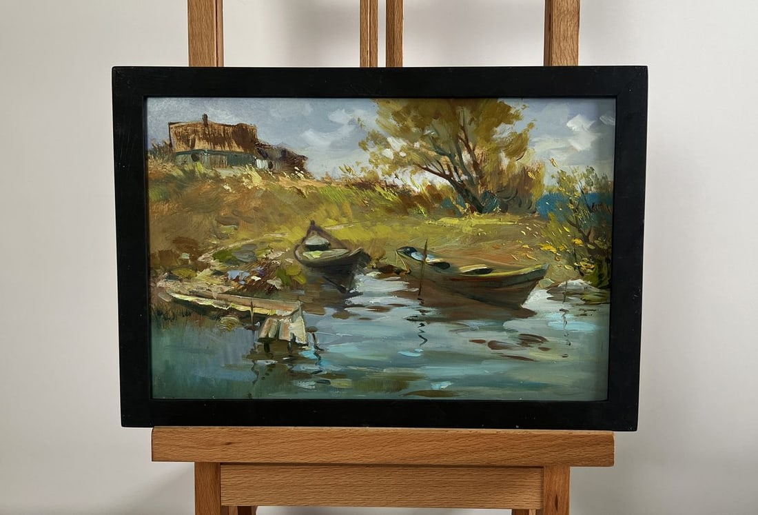 Oil painting Summer peace on the river Yuriy Suprunchuk: NoAAA4275 The painting "Summer Peace on the River" captures a serene riverside scene, bathed in the warm golden hues of late afternoon light. Executed in oil on cardboard, the artwork conveys a sense
