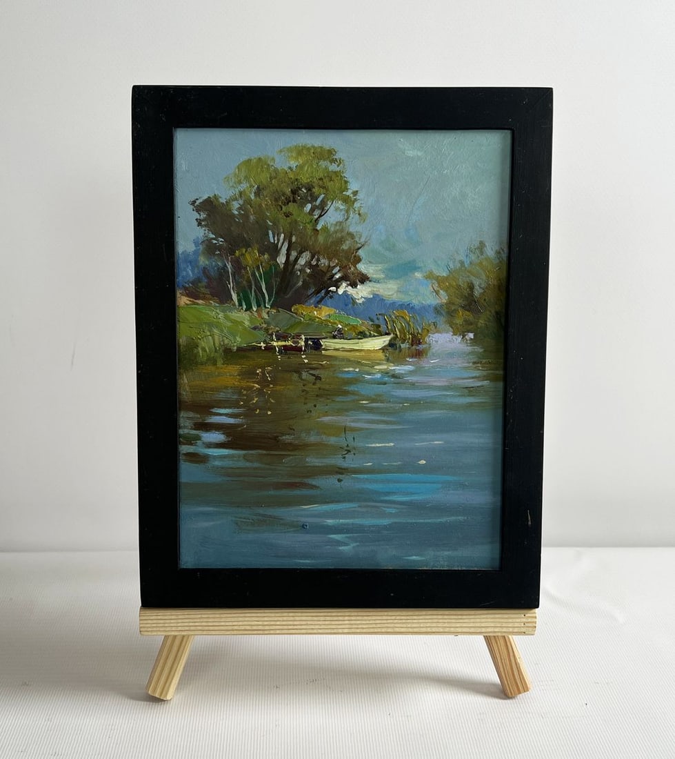 Oil painting Boat ride on the river Yuriy Suprunchuk: NoAAA4285 The painting "Boat Ride on the River" beautifully captures the serenity of a peaceful day by the water. The composition is balanced, with a wide expanse of calm river reflecting the soft hue