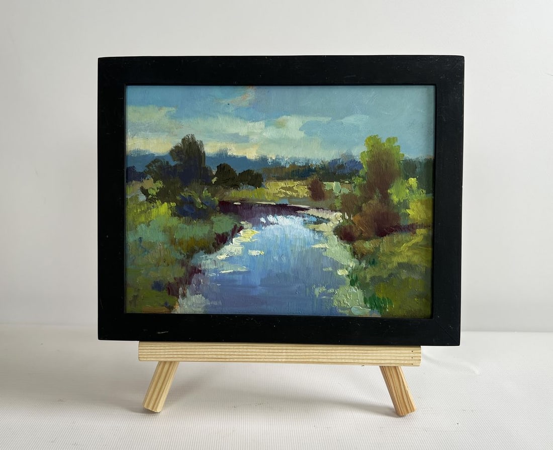 Oil painting Sunset clouds over the river Yuriy Suprunchuk: NoAAA4286 The painting "Sunset Clouds Over the River" captures the fleeting beauty of the evening as the day transitions into night. The artist masterfully portrays the river, reflecting the sky's cha