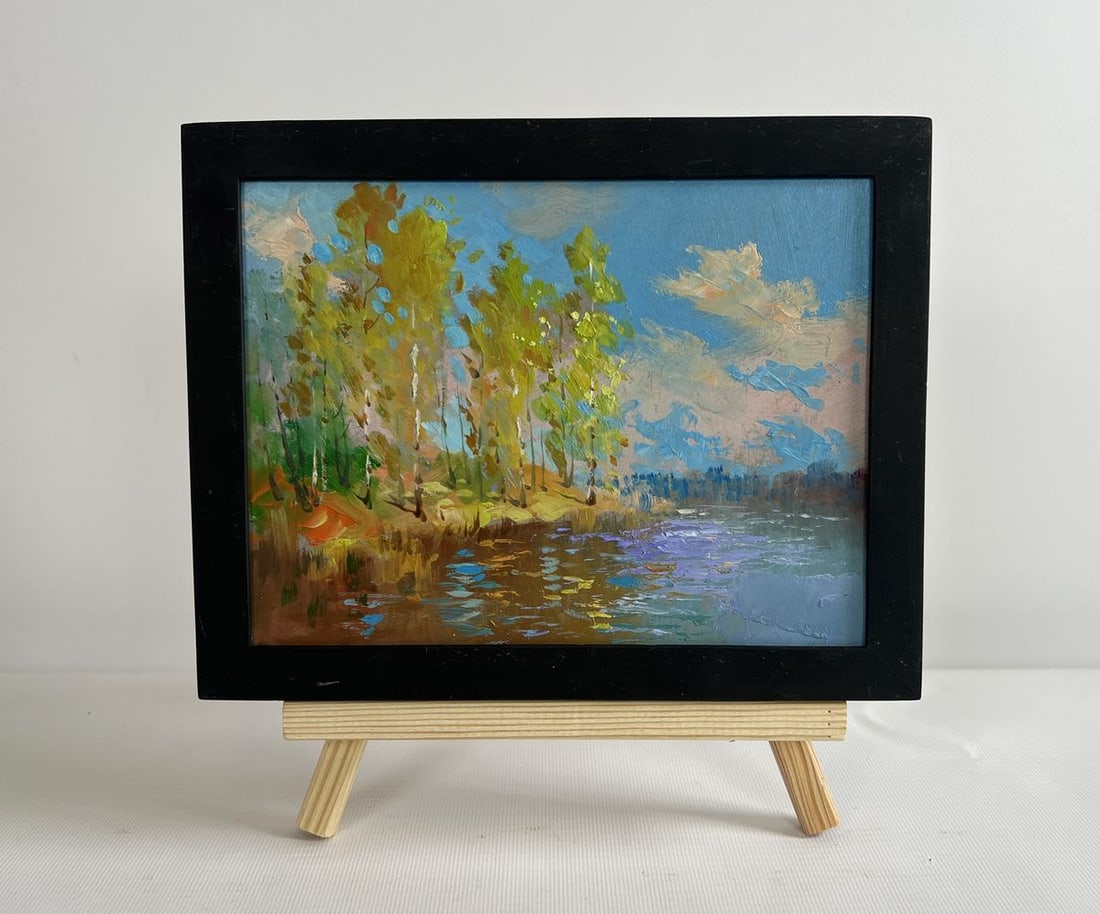 Oil painting Reflection of autumn in the river Yuriy Suprunchuk: NoAAA4288 The painting "Reflection of Autumn in the River" beautifully captures the essence of the changing season, where nature transitions from the warmth of summer to the golden embrace of